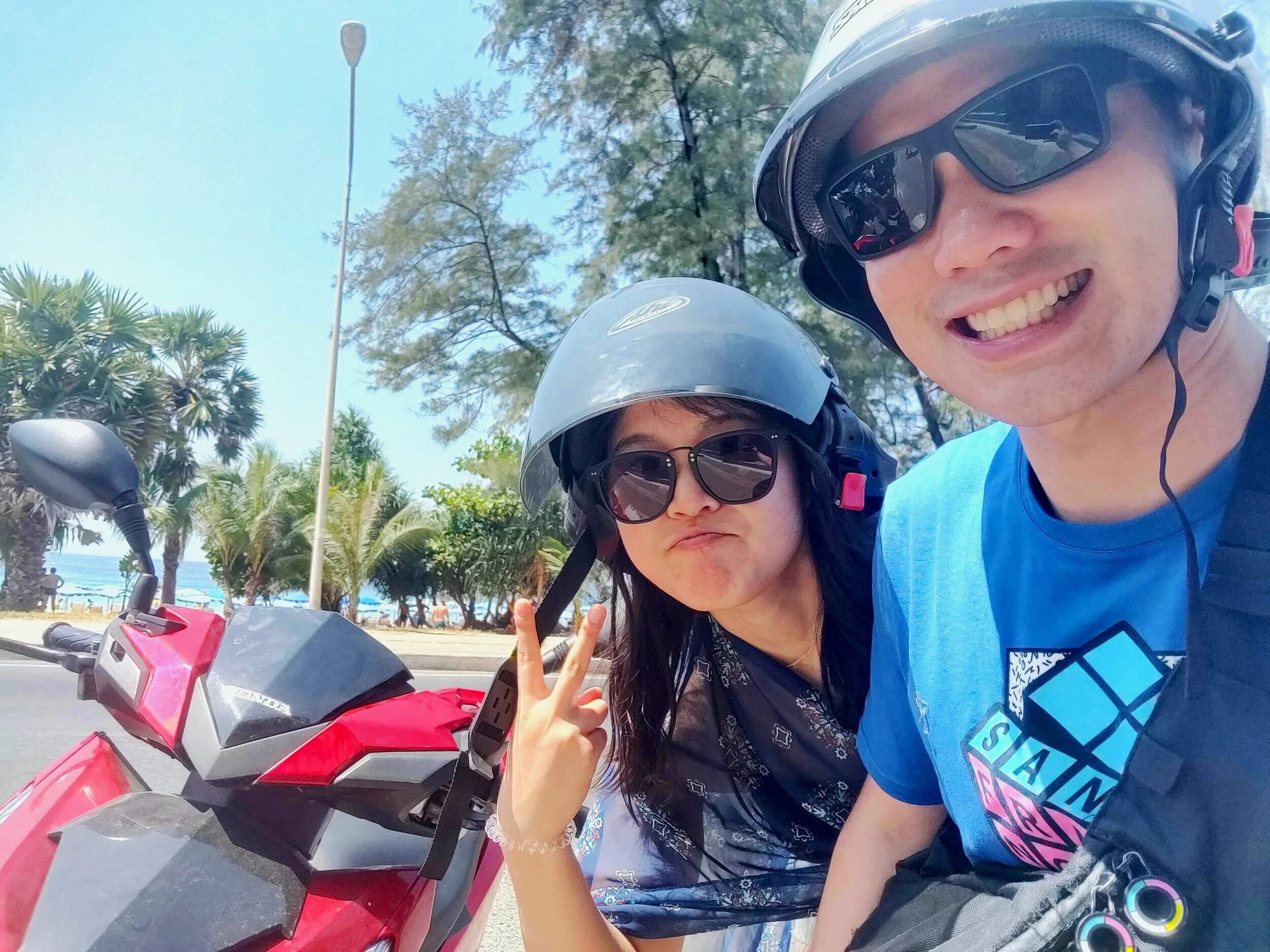 Us and our trusty motorbike. We took this victory bike selfie after our first successful ride to Karon beach!
