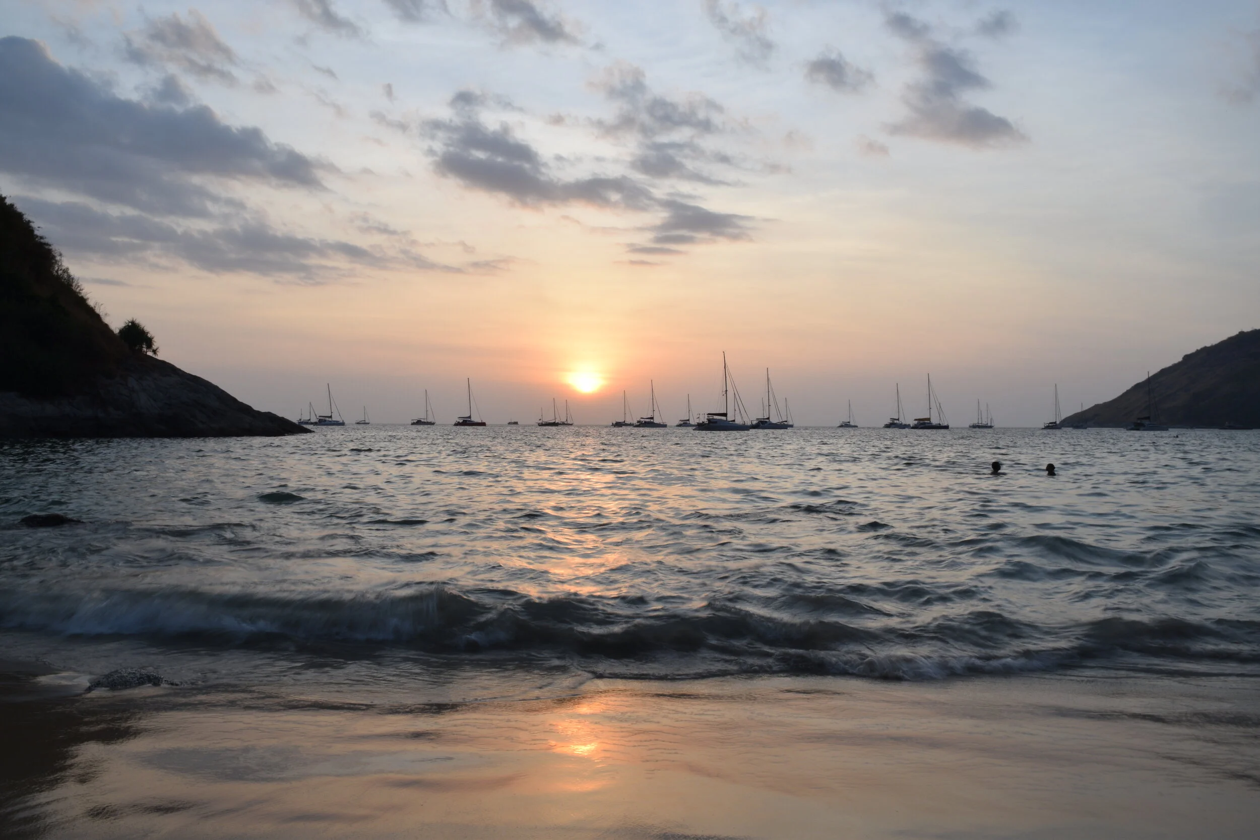 Butter-soft waves at Nai Han Beach. Phuket, Thailand.