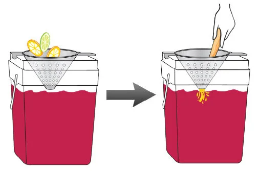 Next, place a metal strainer in the mixing bucket and muddle any remaining slices. This technique will ensure that no pieces end up blocking the spigot later.