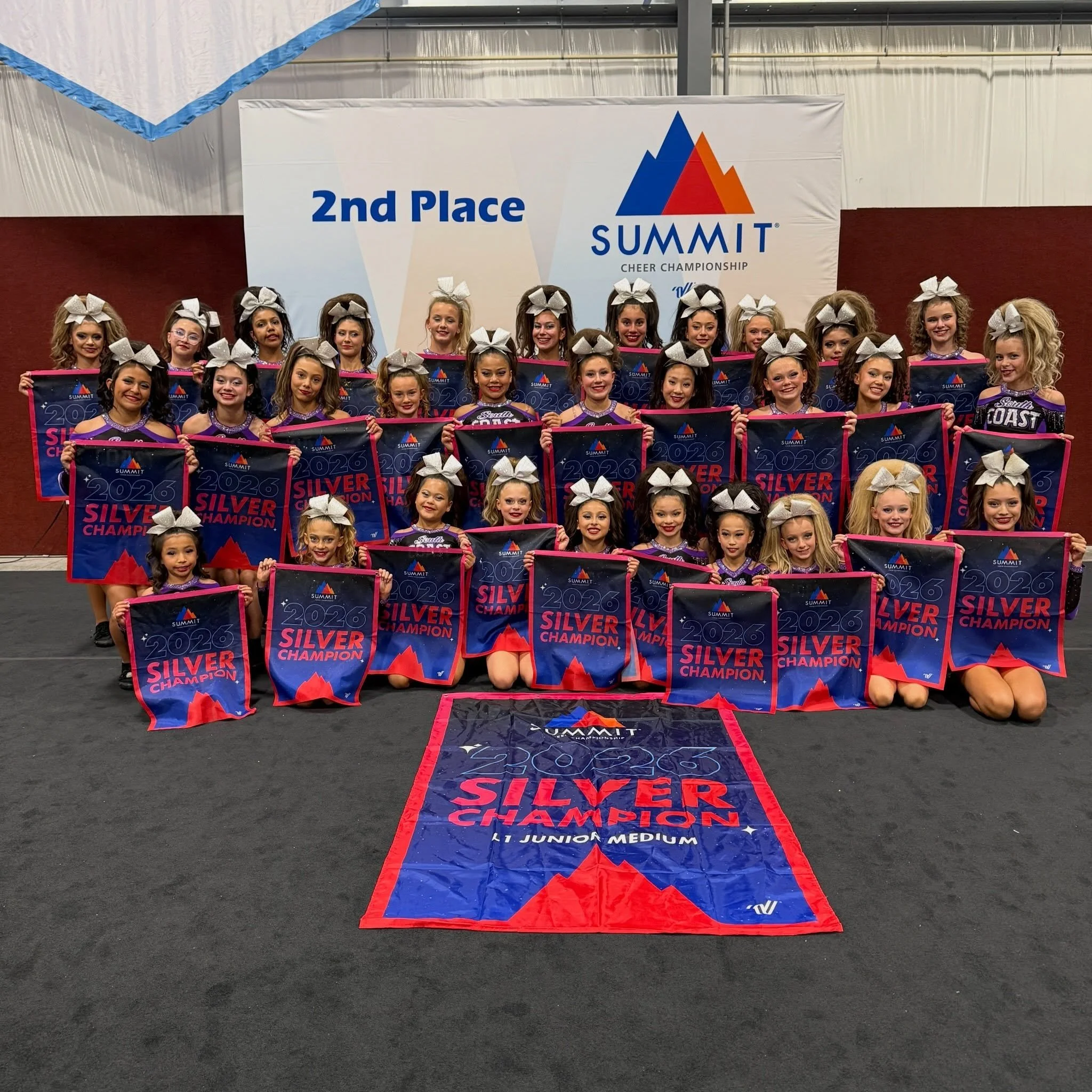 Help us congratulate, Love, on their second place finish at The Summit! This division was jam packed with talented teams and we feel honored to compete amongst the best of the best! So proud of you Love bugs! 💜🖤 #SouthCoastCheer #Love