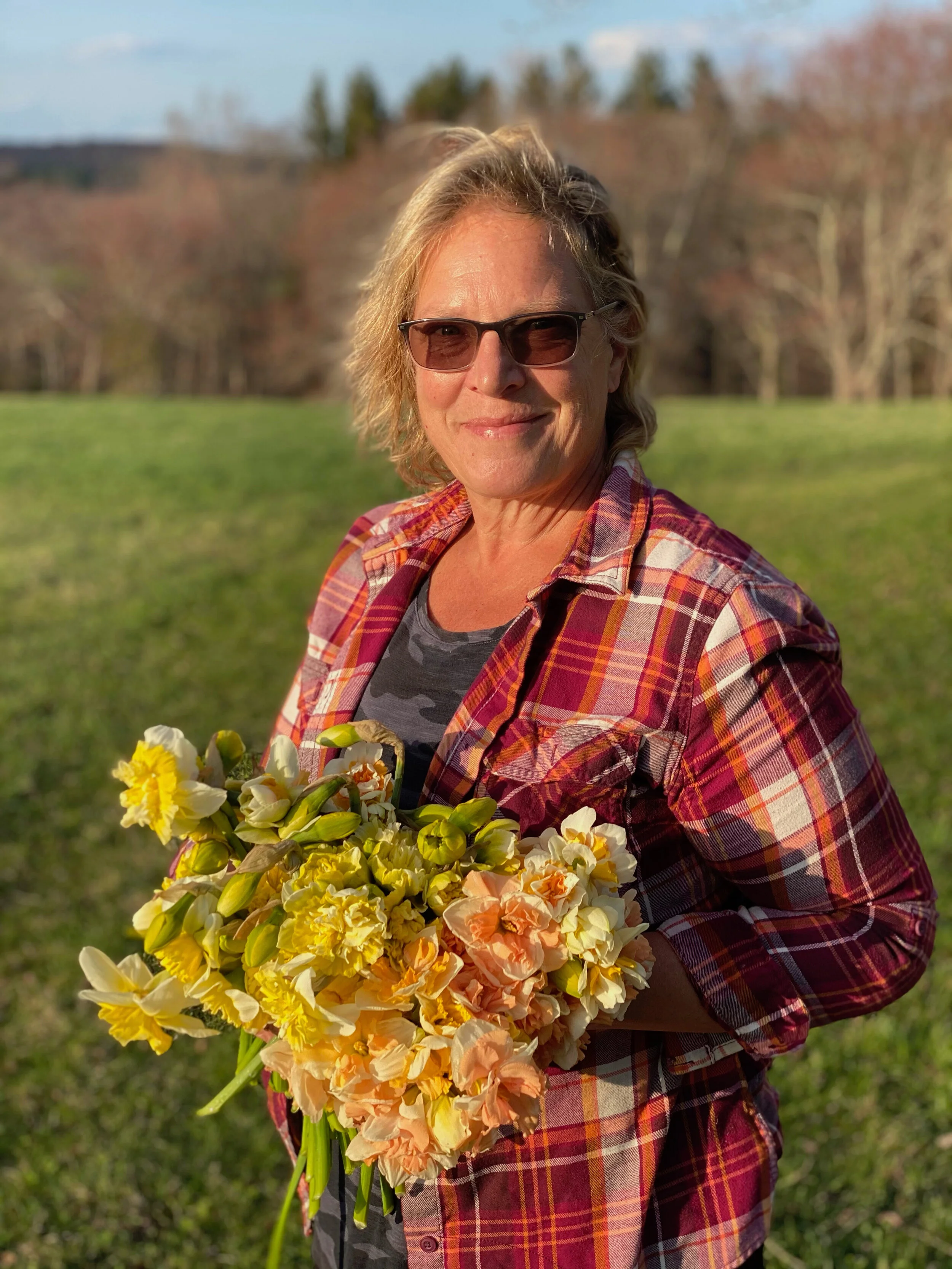 Heidi Luck holding specialty daffodils