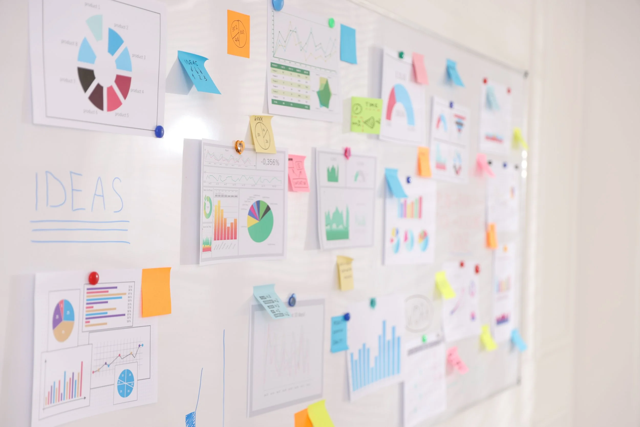 whiteboard-filled-with-data-charts-and-colorful-st-2026-09-10-18-44-42-utc.jpg