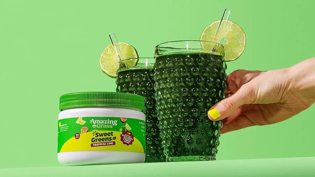 Photography and styling by Amy Shamblen for Amazing Grass featuring various green drinks and fresh fruit.