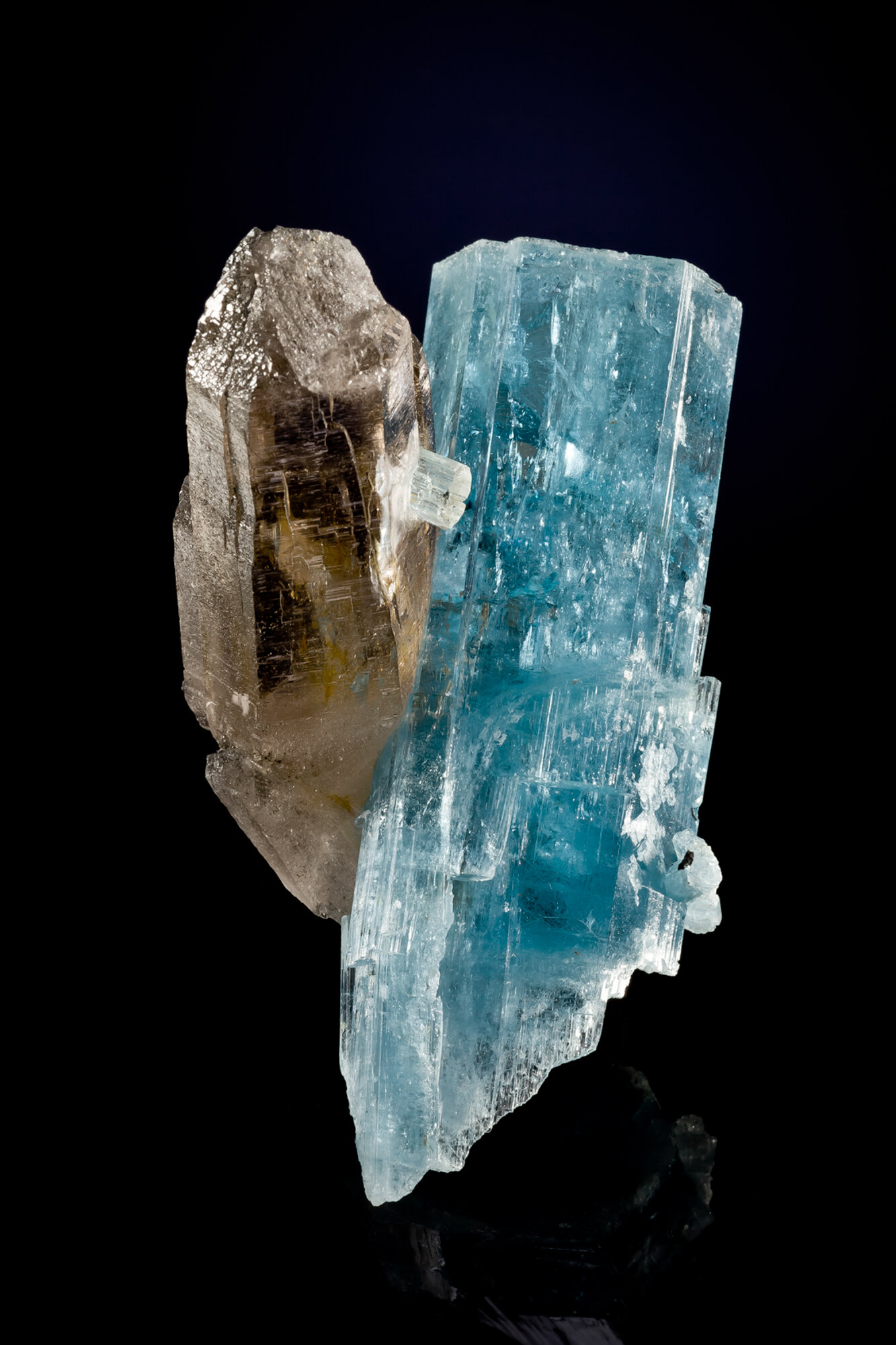  Aquamarine with smoky quartz, 8.3 cm, from Da Li, Yunnan Province, China. Found in 2010. 