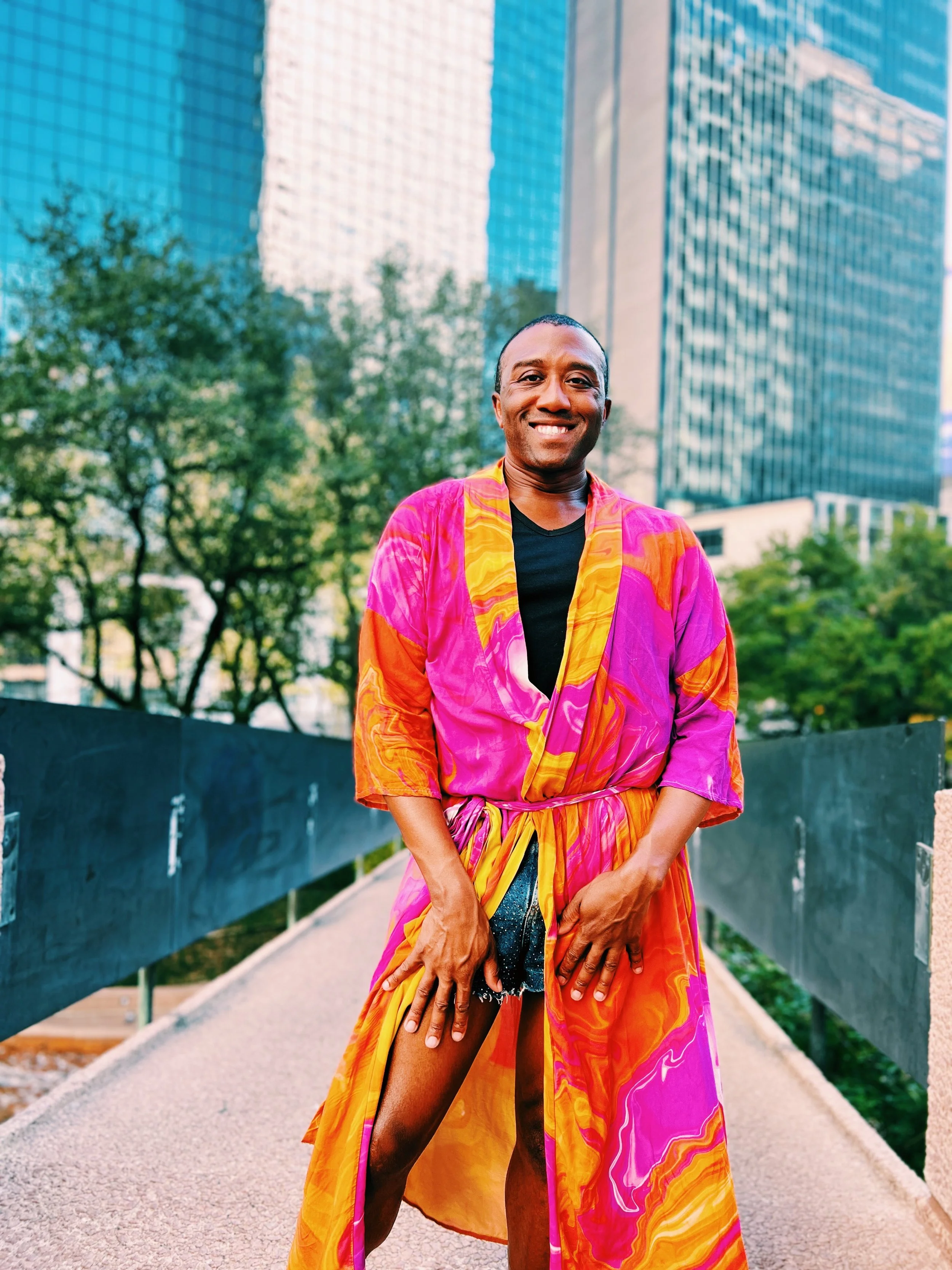person standing outside in colorful duster robe