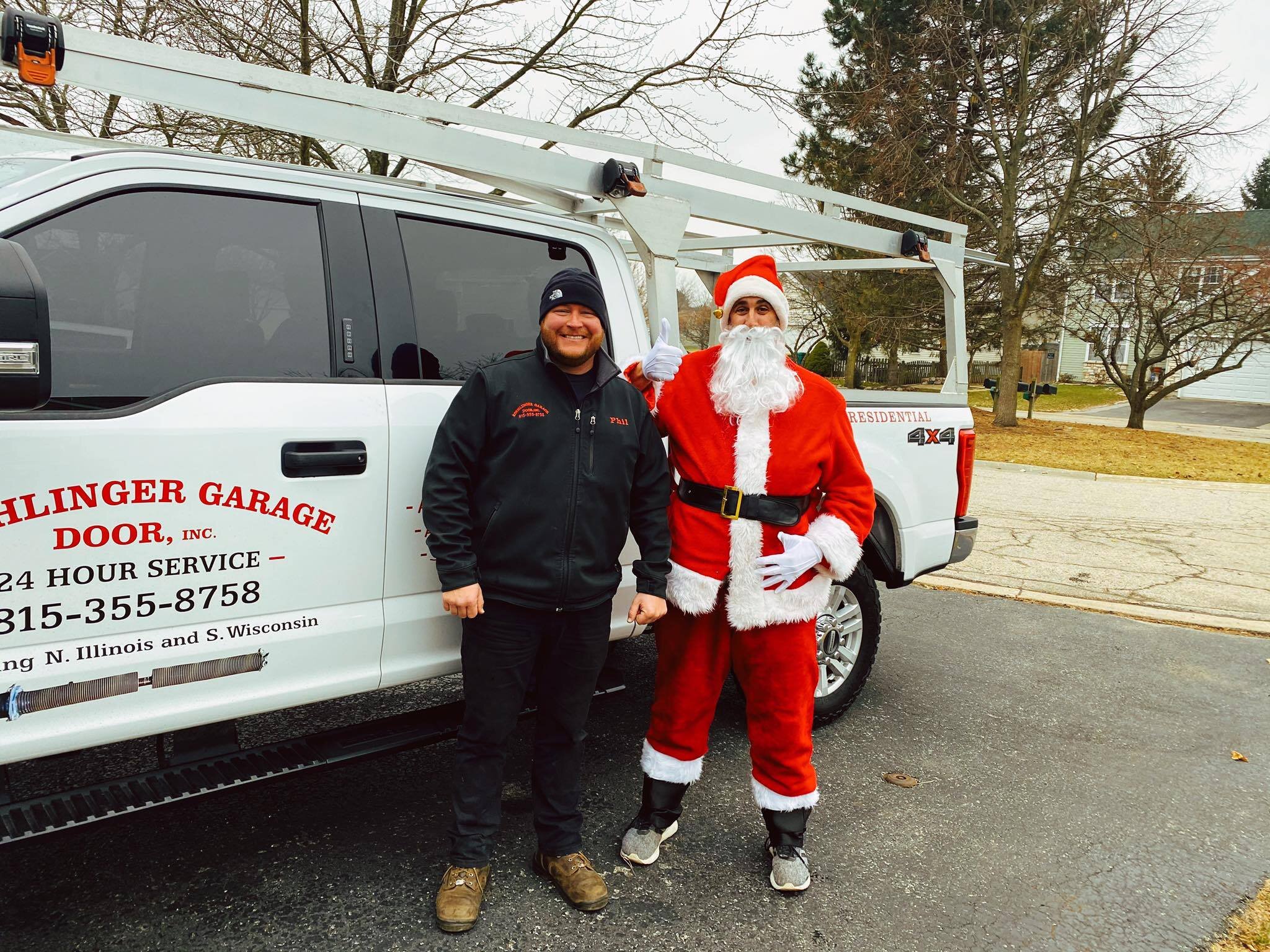 Santa pays a visit to Phil and Koehlinger Garage Door - Happy Holidays!