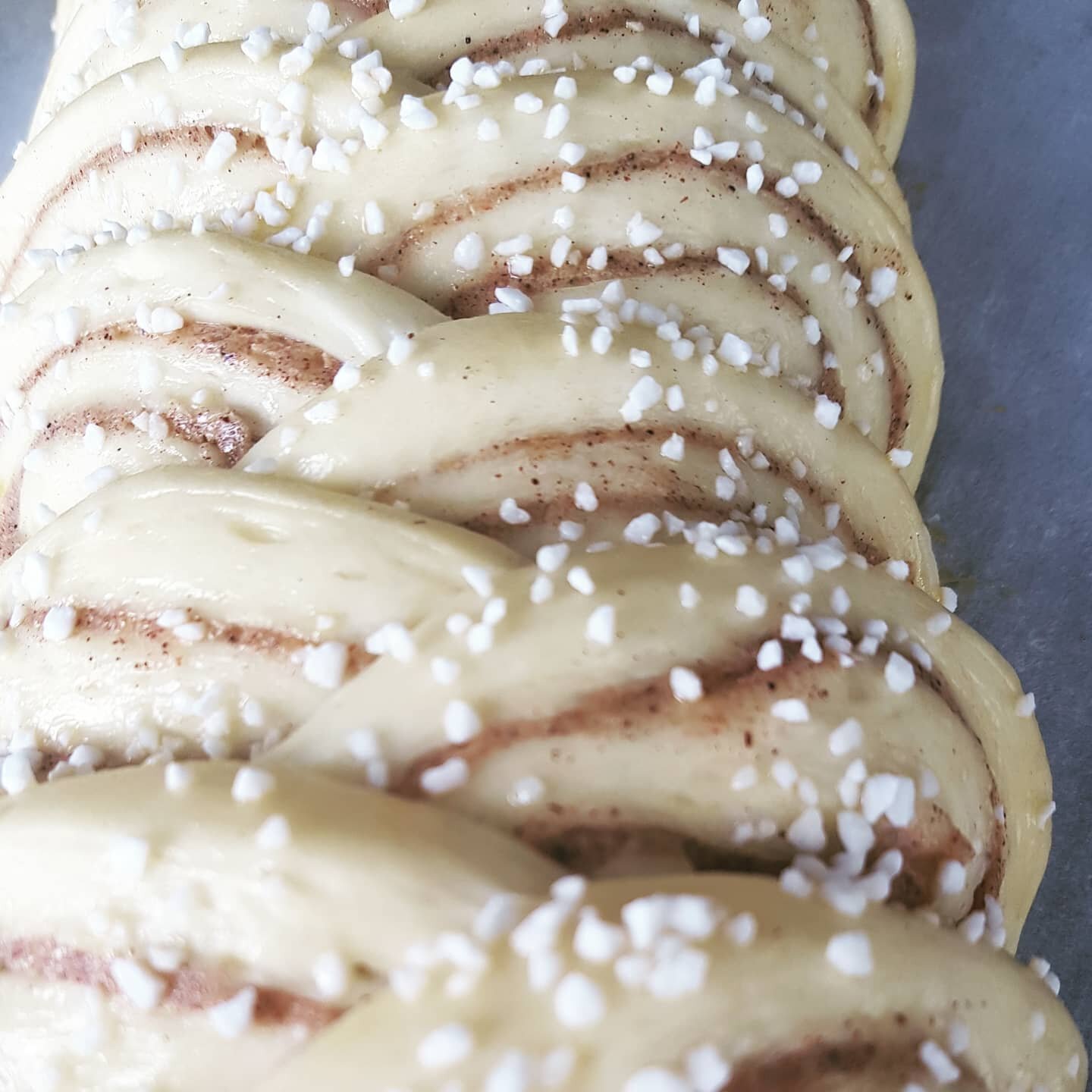 Pre-oven shot of NZ's best cinnamon bun, just in a slightly different shape.

Wheat bread plaits are very common in Scandinavia and the perfect way of sorting out your morning tea shout -just make sure you slice it yourself so you're certain to get a