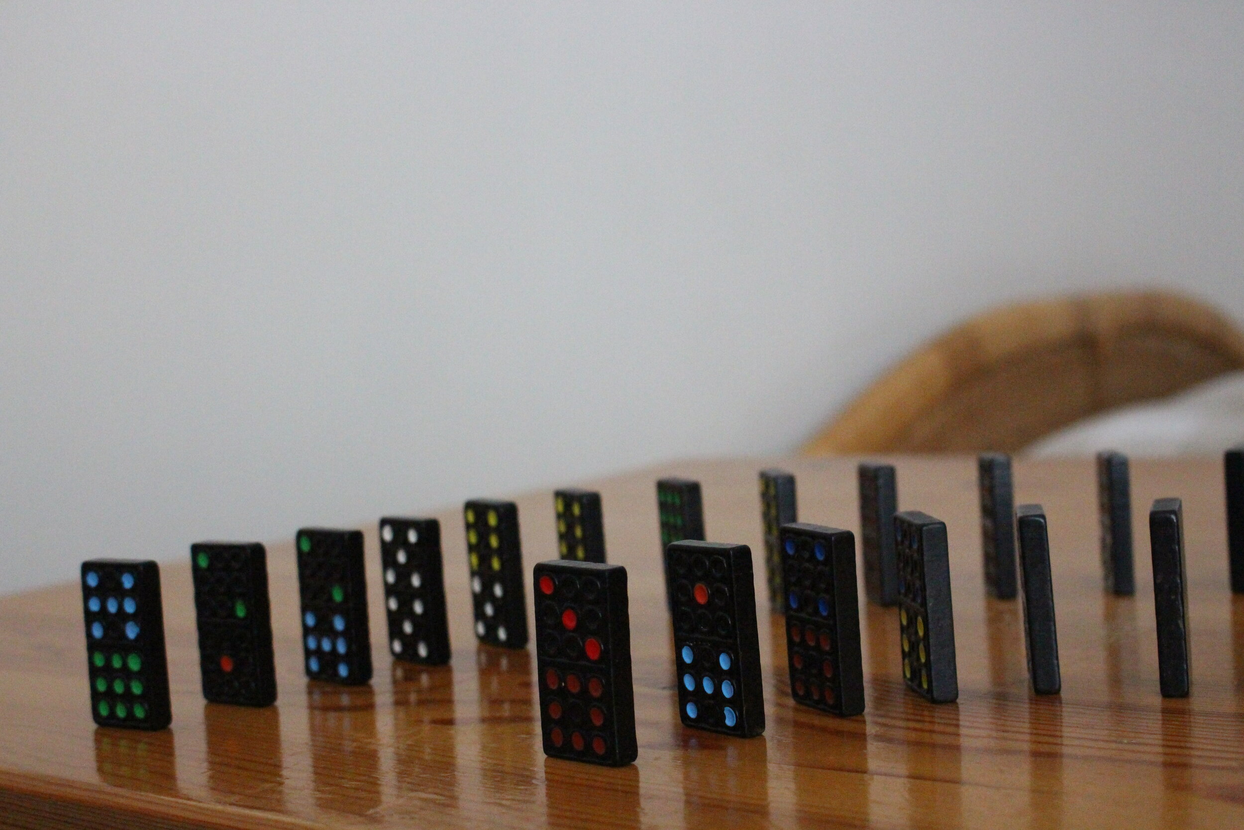Each domino does only one thing: once it receives force, it falls over.