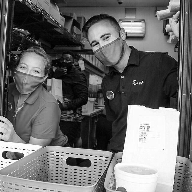 Two Chick-fil-A Team Members In the Drive Thru
