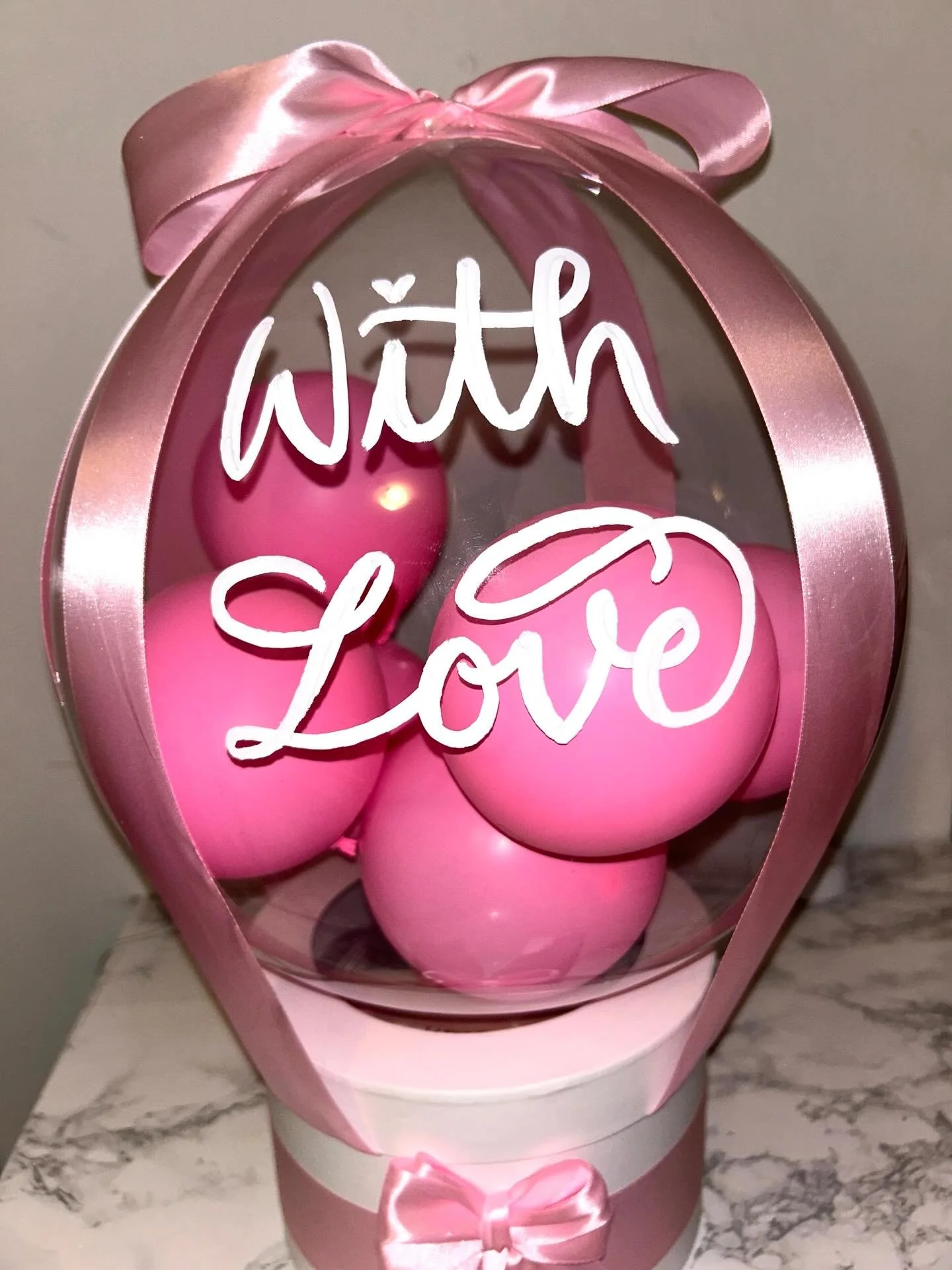 Added a couple special touches to a bobo balloon gift box 🎀

.
.
.

🖋️ Toronto calligrapher and engraver providing luxury experiences for retail, corporate, and personal events. 

✨ Link in bio to inquire!

#torontocalligrapher #luxurygifting #cust