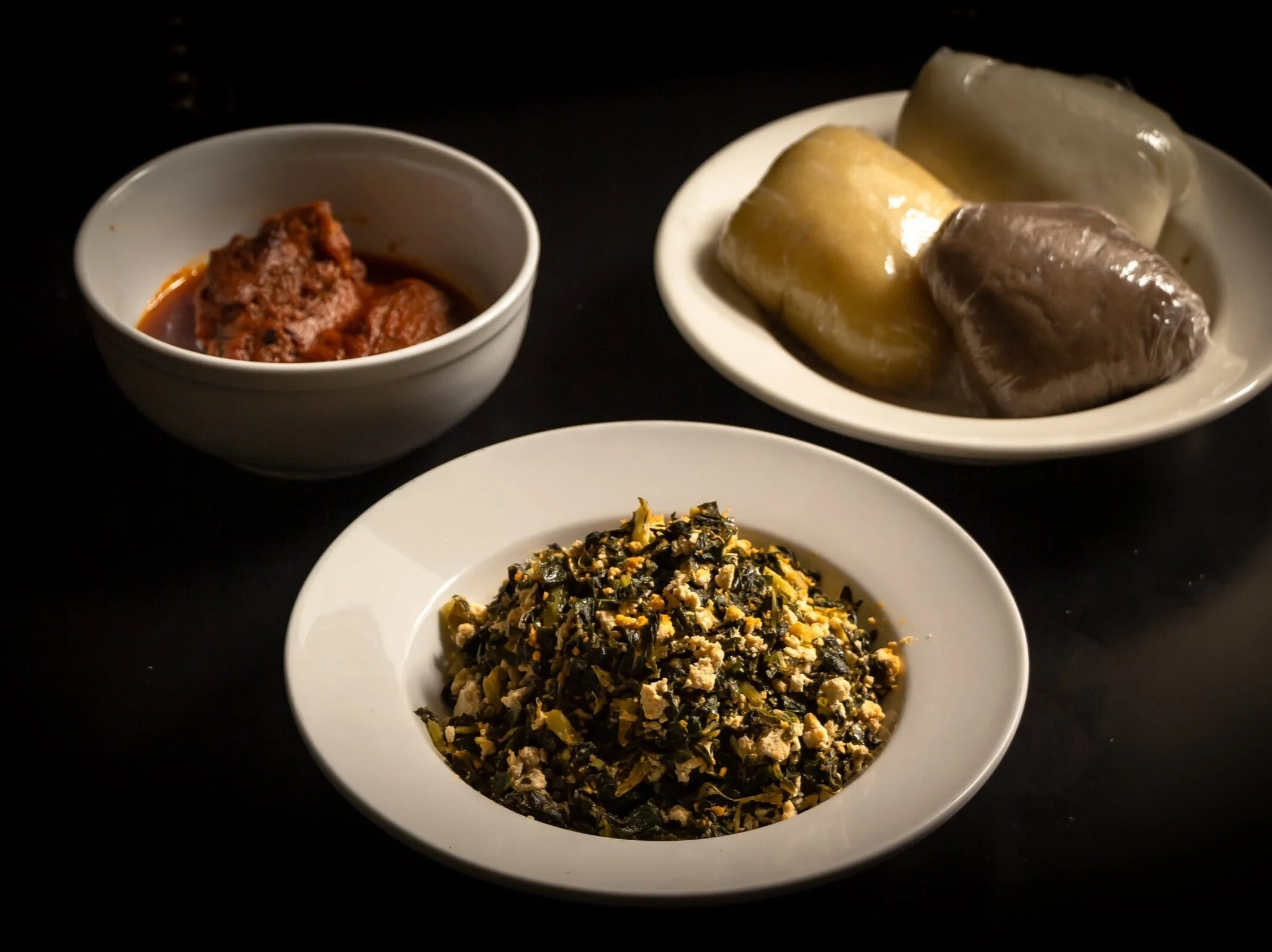 Efo with EgusiGrounded melon seed steamed with spinach and assorted meat. $13.99