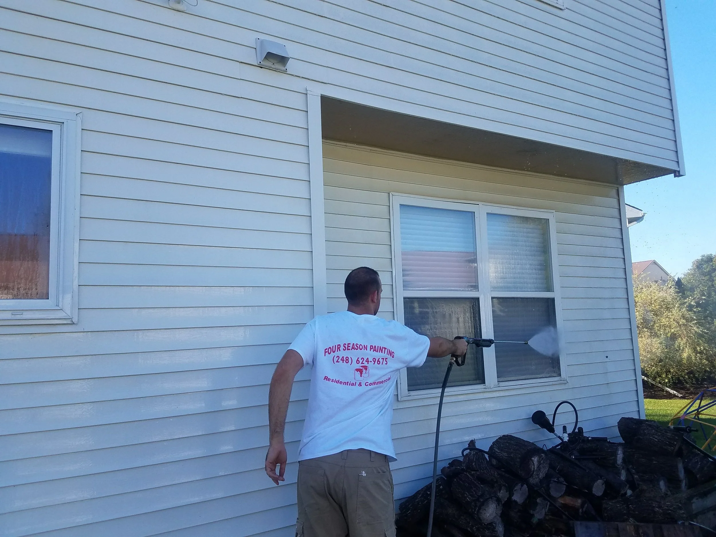 house with a pressure washing in Milford Township, Michigan.