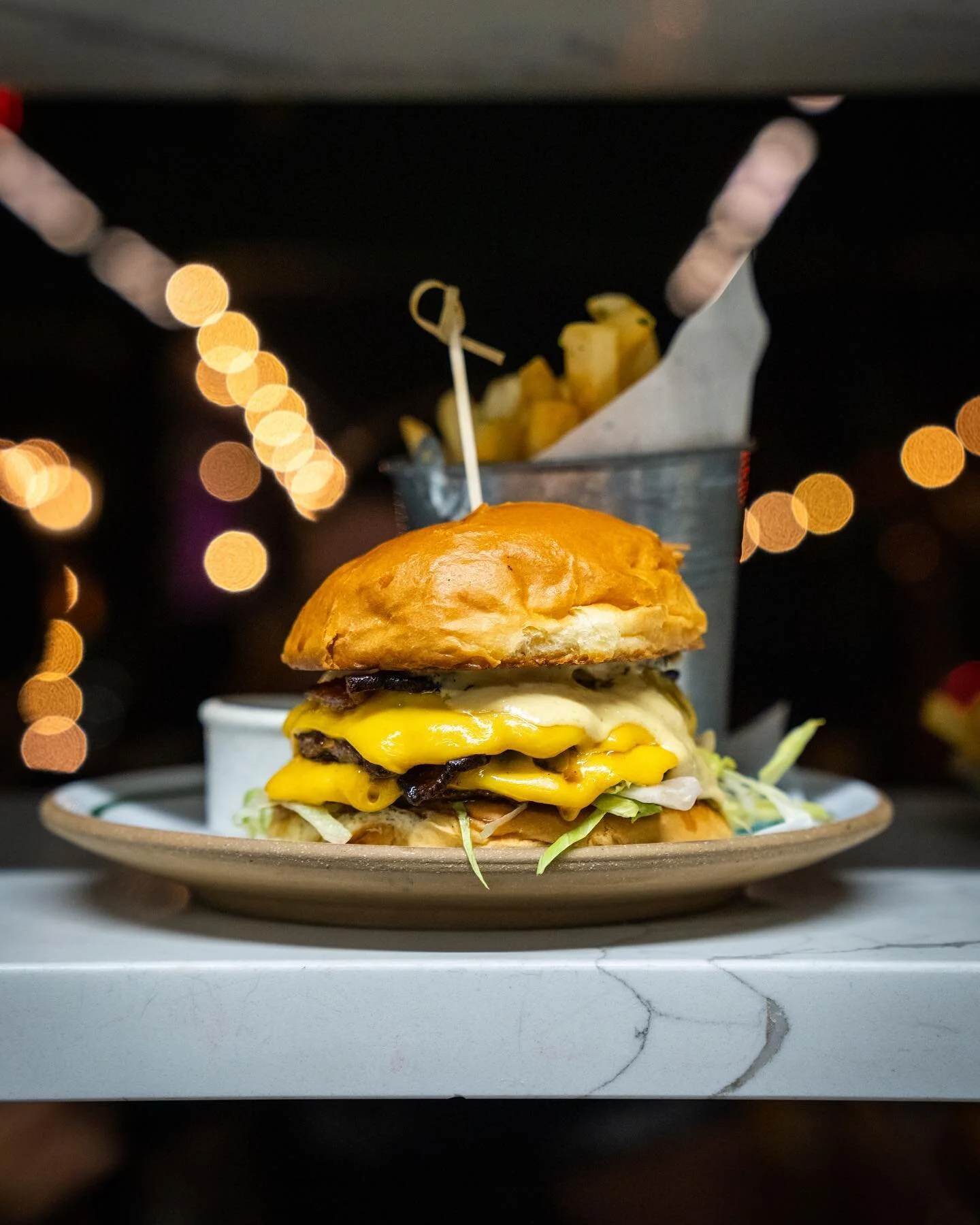 It&rsquo;s okay to treat yourself 🍔 the weekends here and we think you deserve a double patty, lettuce, cheese and special sauce! 

Walk-in or book a reservation link in bio 

📸 @cocktail_lens 

#ivorypearl #foodie #bostonfoodies #burger #oysterbar