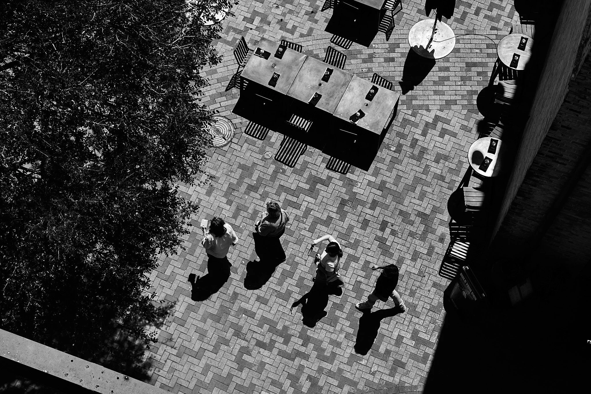 Leica street photography series by San Antonio-based photographer John Hendrick. Captured over six years using the Leica M240, M246 Monochrom, Q-P, and SL with Leica M lenses including the 50mm Summicron, 35mm Summilux, 90mm Summicron, and 28mm Elmar