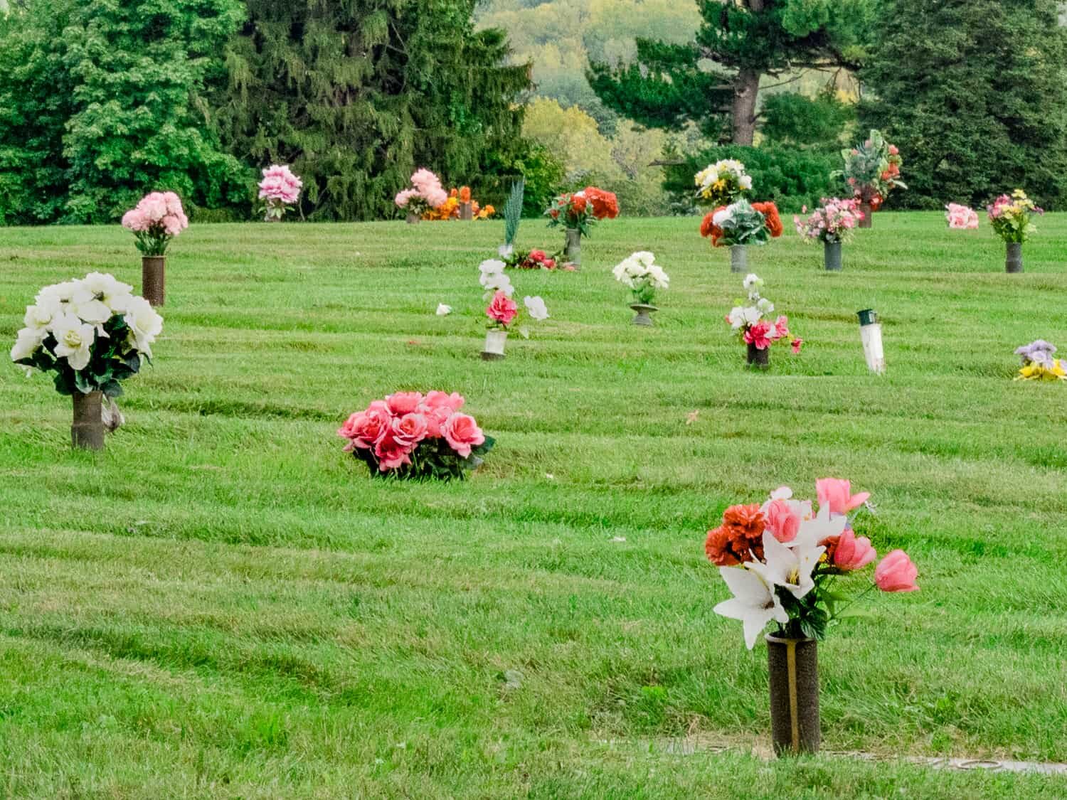 memorial-garden-cemetery-flat-markers-floral-offerings.jpg