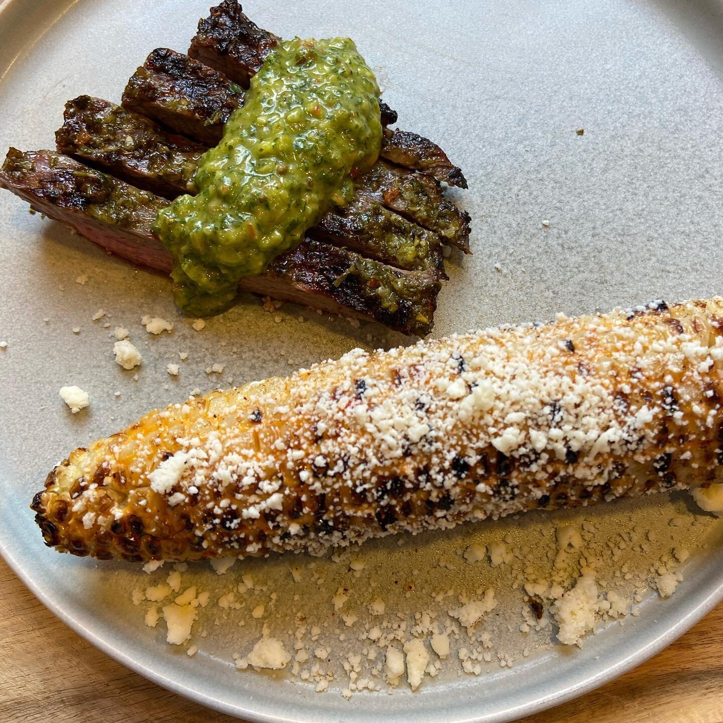 Saturday dinner. Beautiful corn from @marinichristmas served as grilled Mexican street corn with spicy Mayo, Chili pepper and Cotija cheese - so amazing! Oh and a supporting act by some chimichurri marinated flat iron steak. #dinner #saturdaydinner #