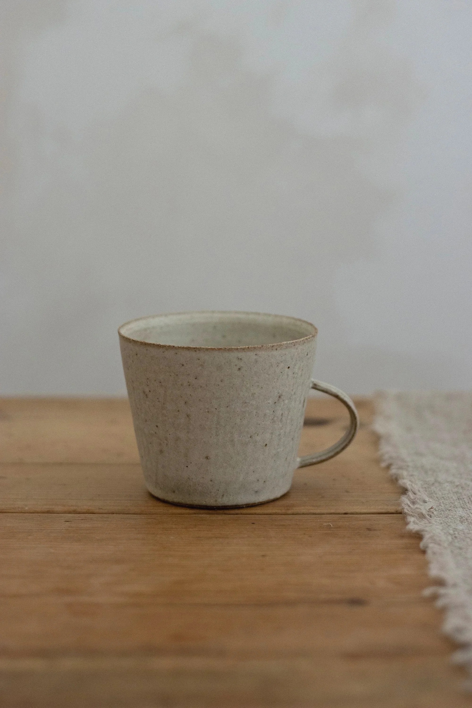 Handled cup in stone