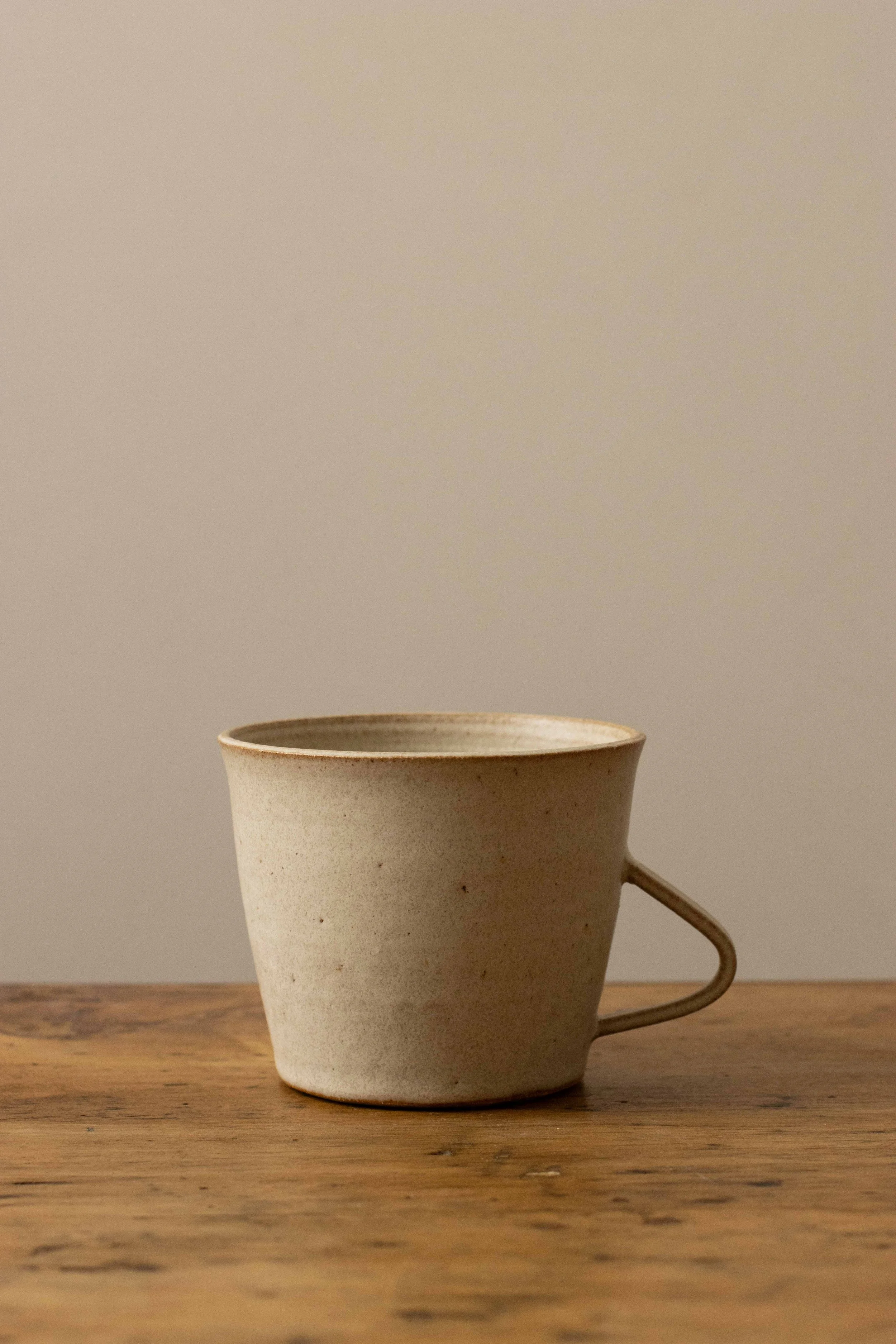 Handled cup in stone