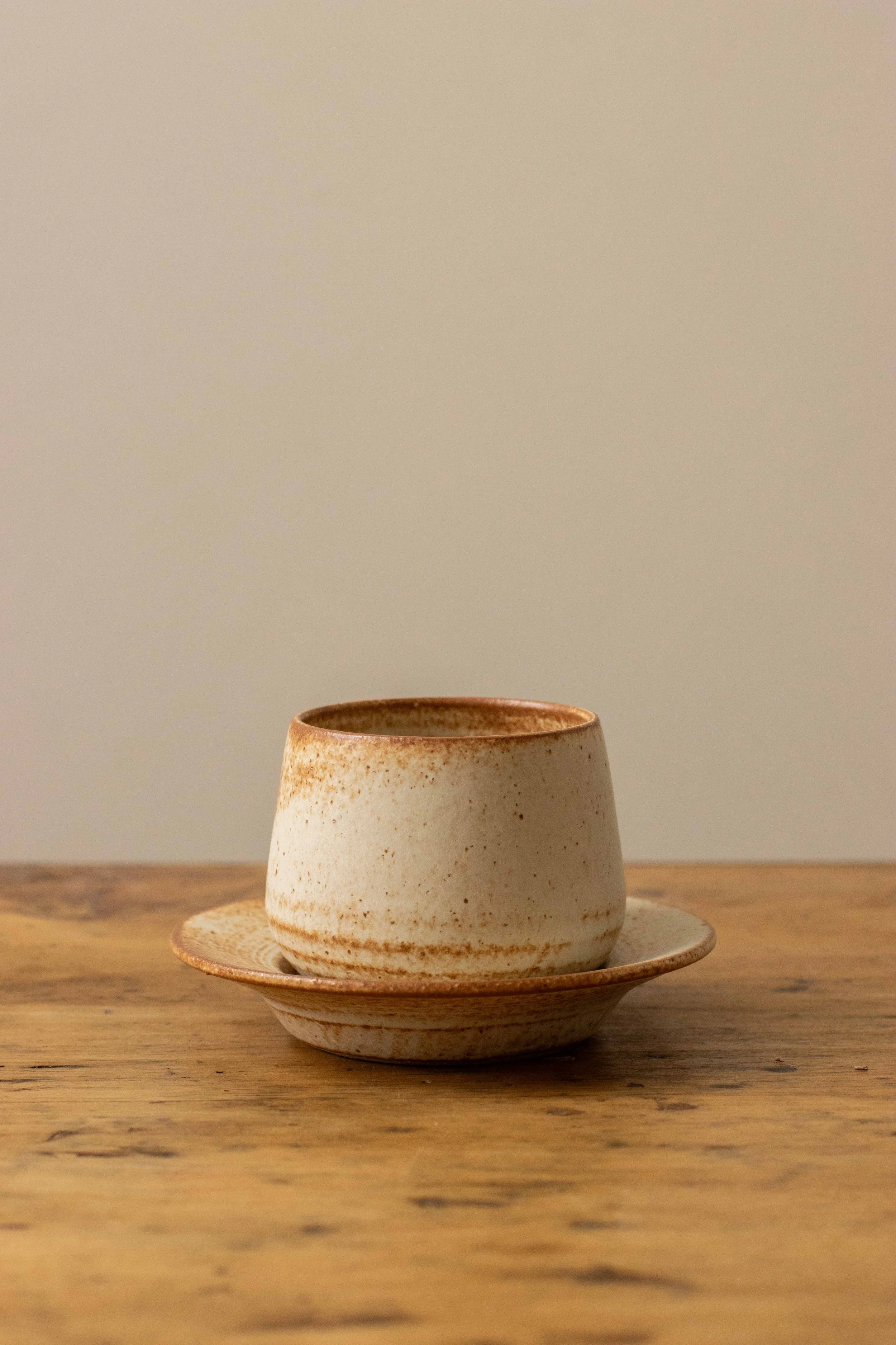 Cup and saucer in cinnamon