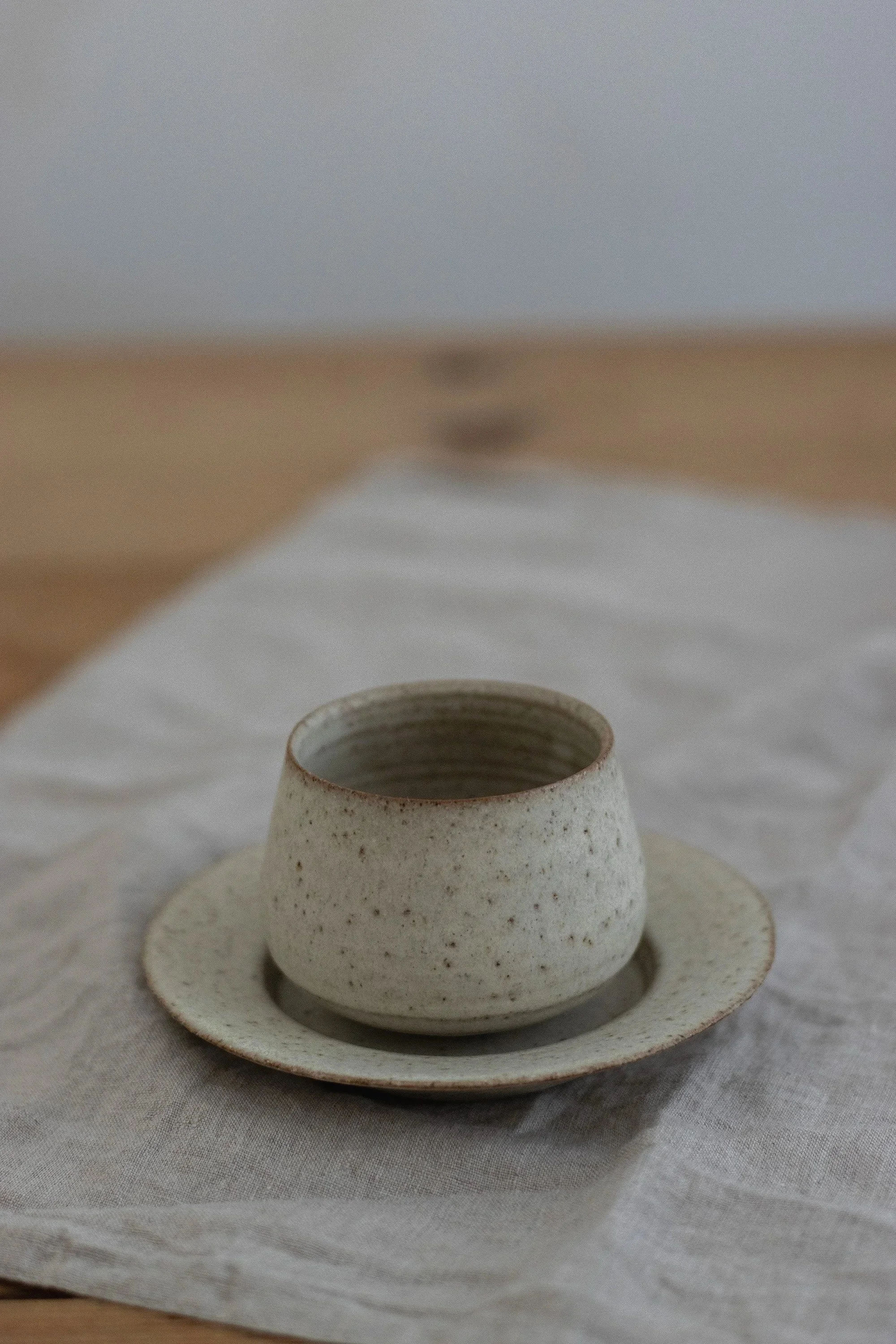 Cup and saucer in stone