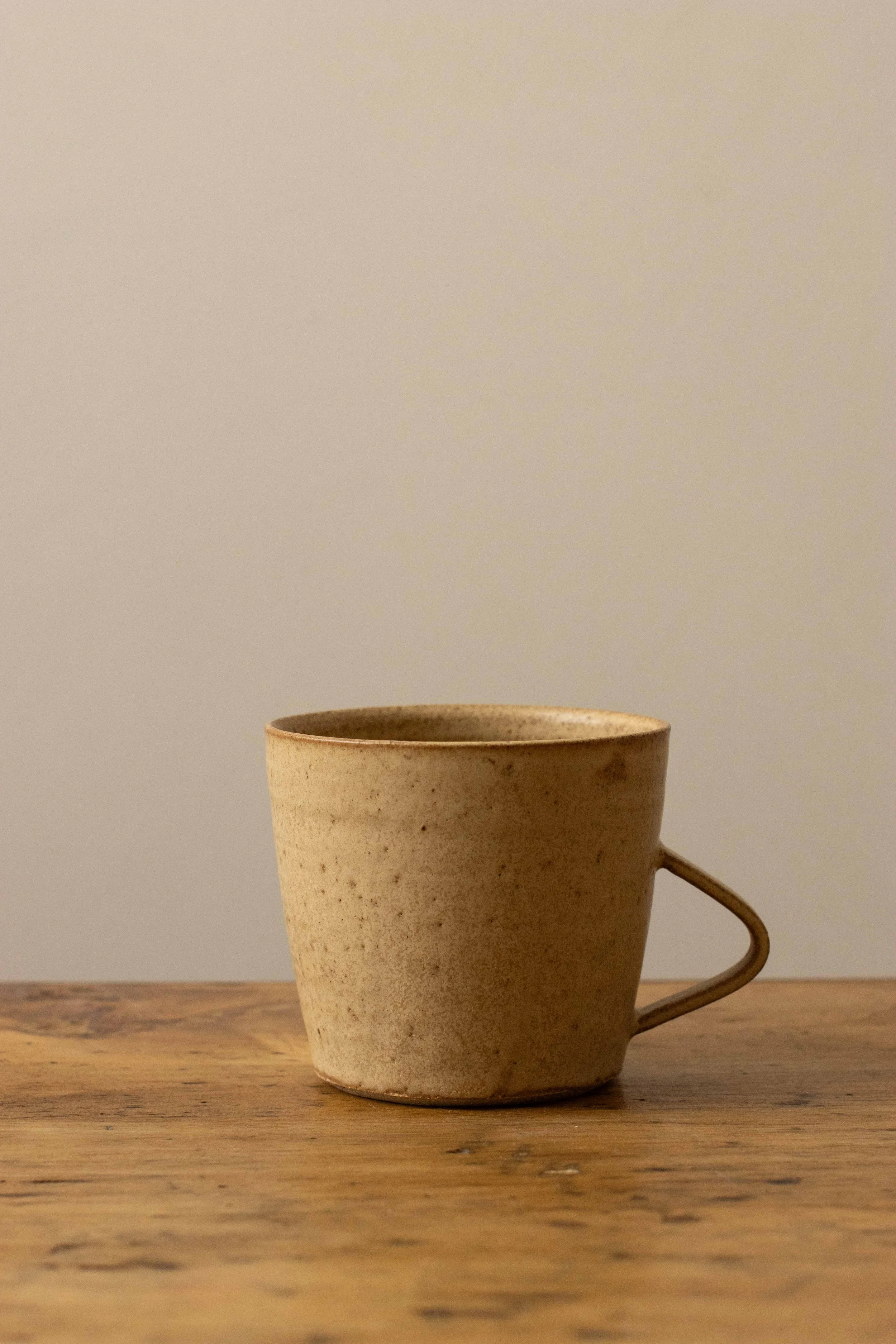 Handled cup in hay