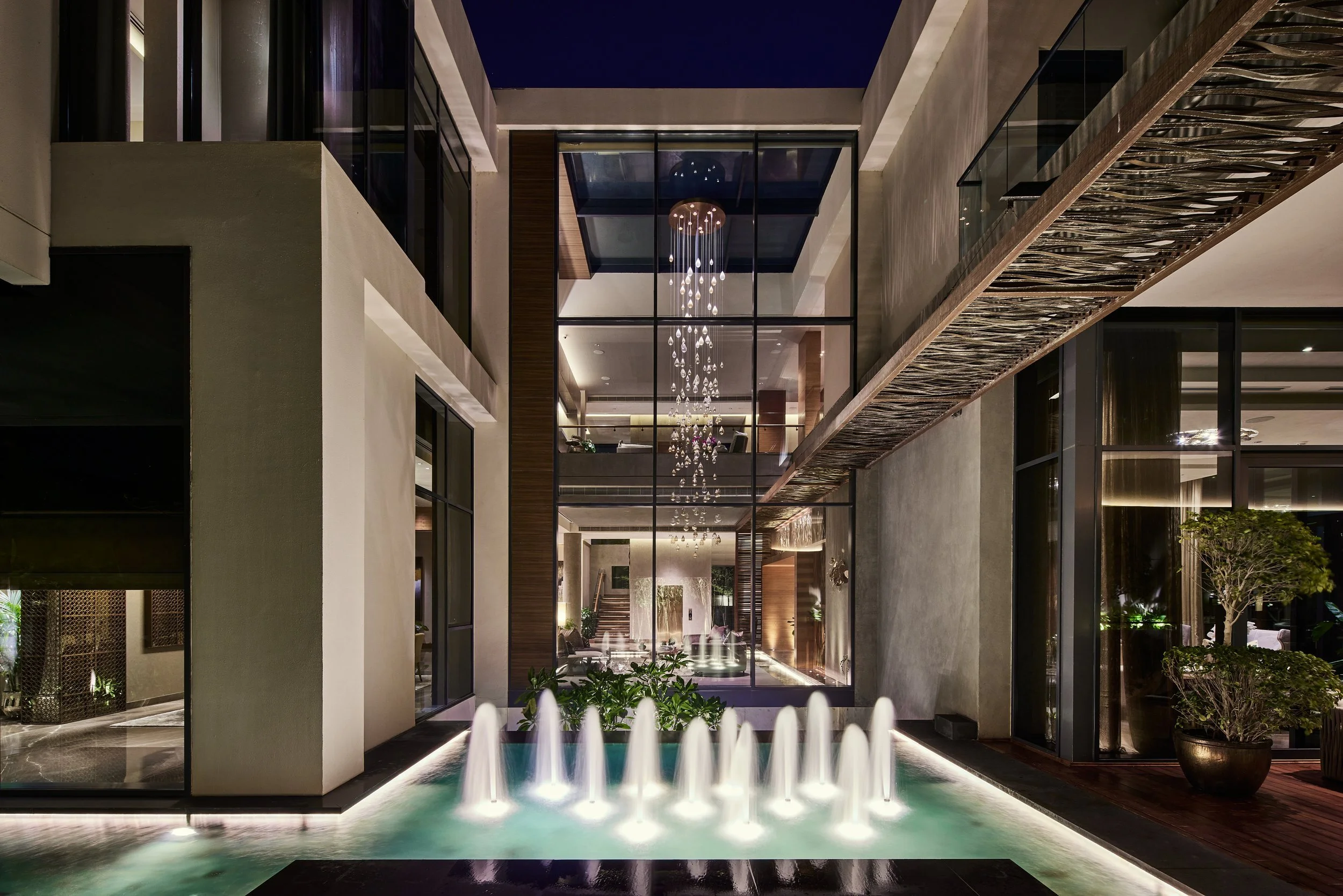 M Villa and its pool lit at twilight, Dubai Hills Estate