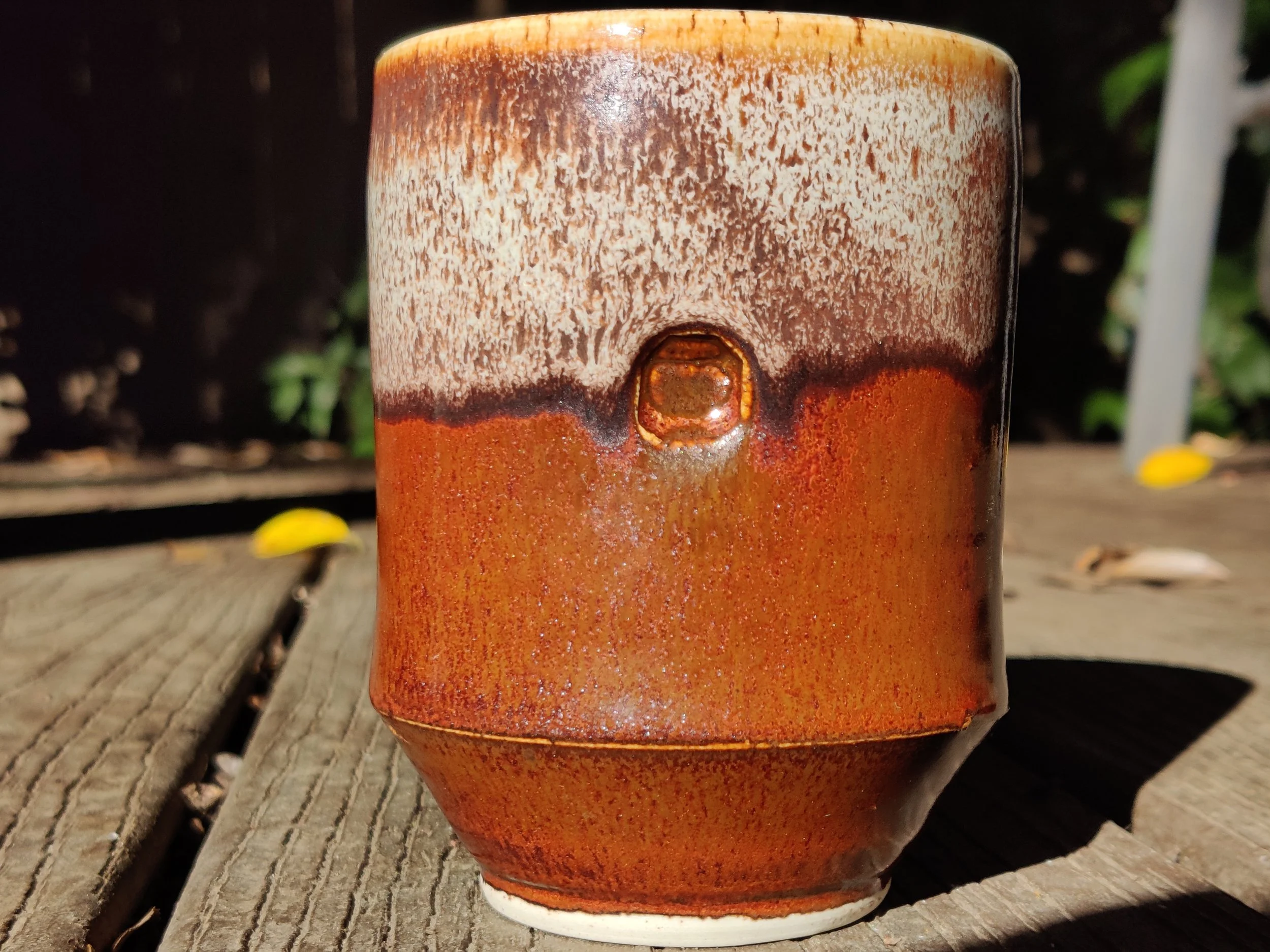 Ancient greymon under lumos cone 6 ox.jpg