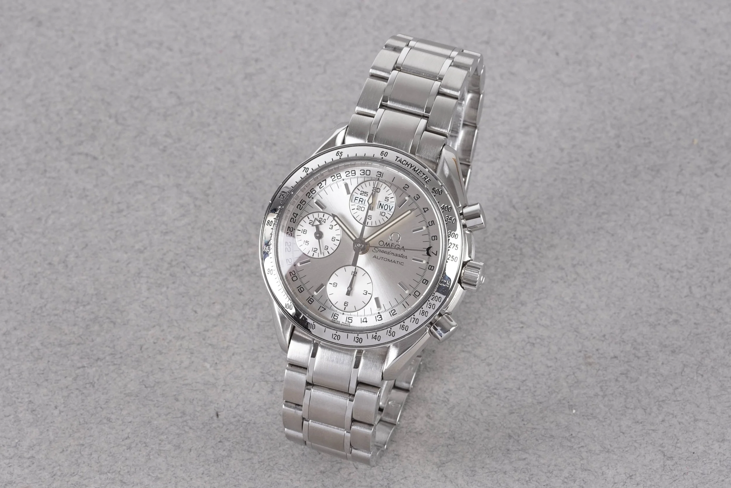 OMEGA SPEEDMASTER DAY DATE CALENDAR AUTOMATIC CHRONOGRAPH W/ GUARANTEE CARD REF. 35233000