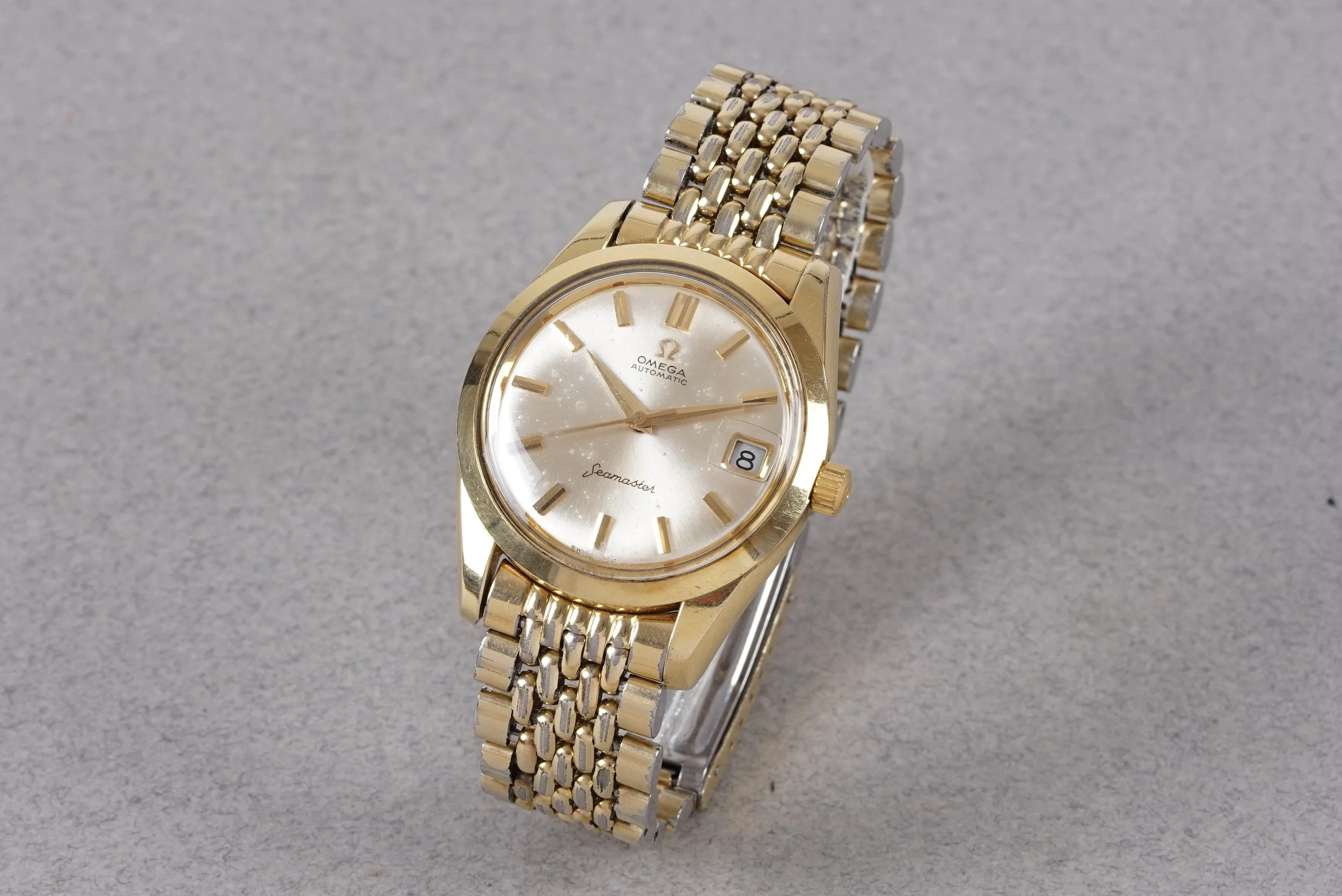OMEGA SEAMASTER GOLD PLATED AUTOMATIC DATE REF. 166.010 CIRCA 1962