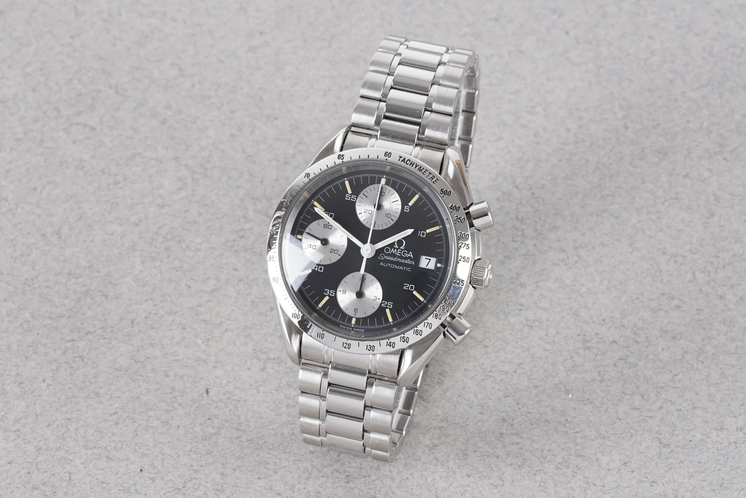 OMEGA SPEEDMASTER AUTOMATIC DATE CHRONOGRAPH W/ GUARANTEE CARD REF. 35115000