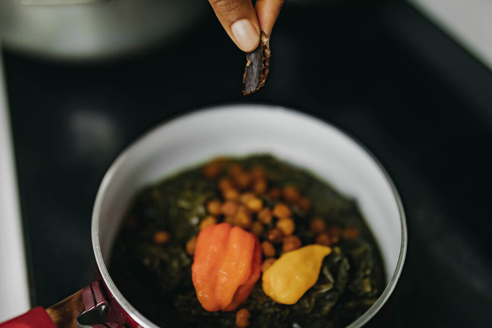 Add all spices to boiled cocoyam leaves.