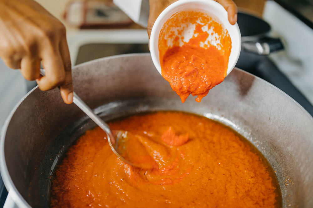 Add tomato mixture to pot. 