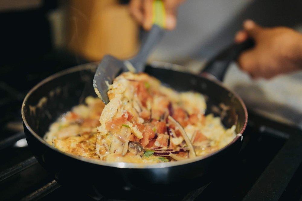 Cook omelette in skillet.