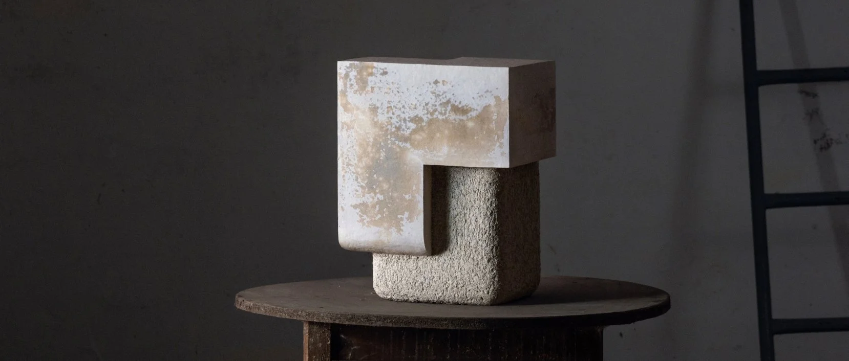 Coalescence sculpture by Marek Cwiek, on display at Studiotwentyseven Gallery in Tribeca, New York, merging modern design with sculptural art for collectors.
