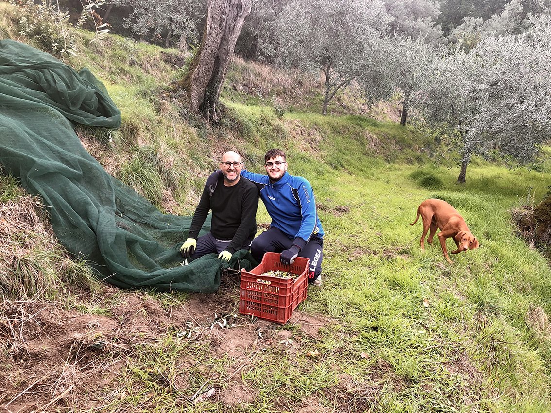 Alfonso with his nephew during the harvest.jpg