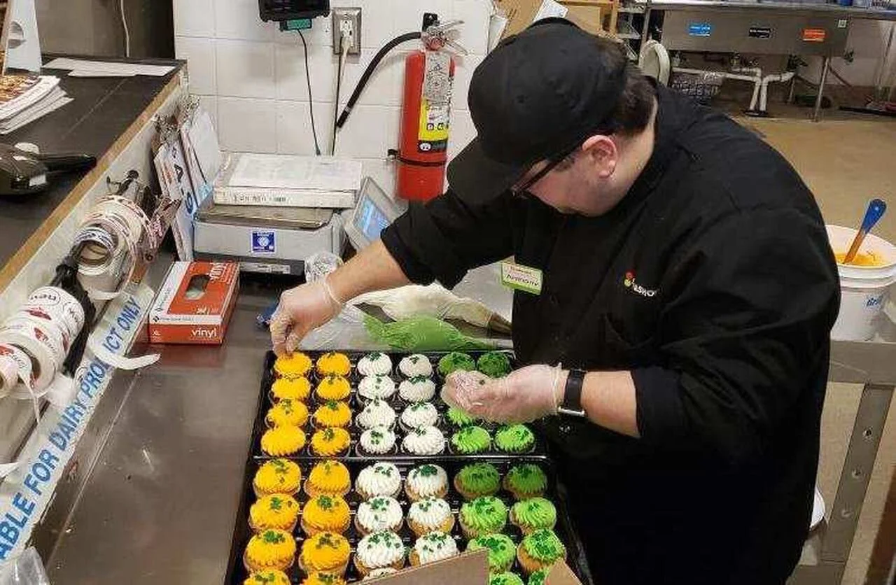 Antonio Russo working at the Shop & Shop in Madison