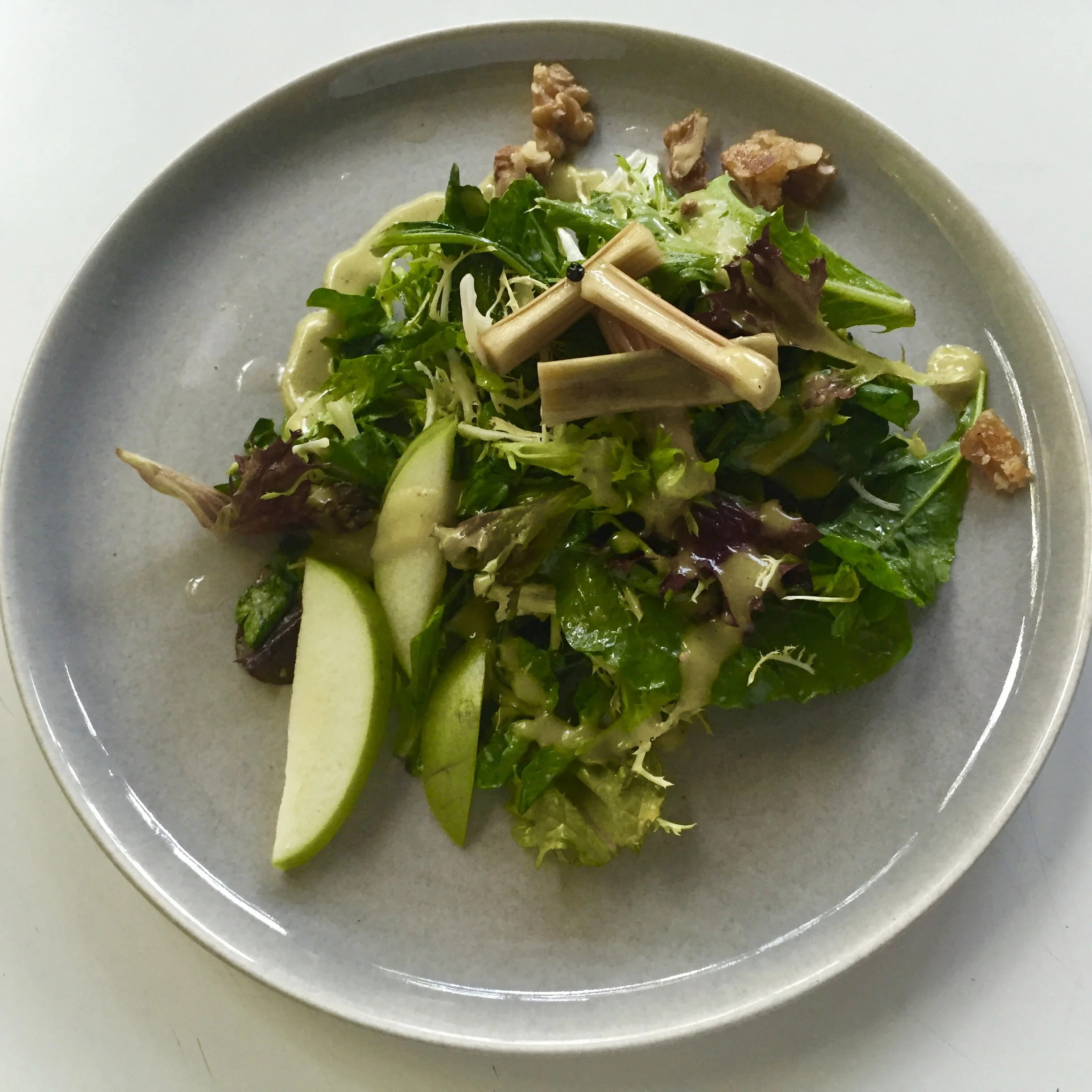 mache salad with green apples, pickled rhubarb, walnuts and champagne dressing