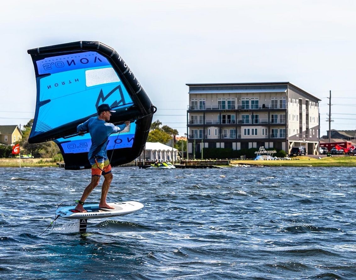 If you&rsquo;re coming to Cape Hatteras to foil, doesn&rsquo;t it make sense to stay at a place with deep enough water to foil?🤷 @nuzzipod and @esben.b enjoying the Watermen&rsquo;s Foil Garden just steps away from your front door at Watermen&rsquo;