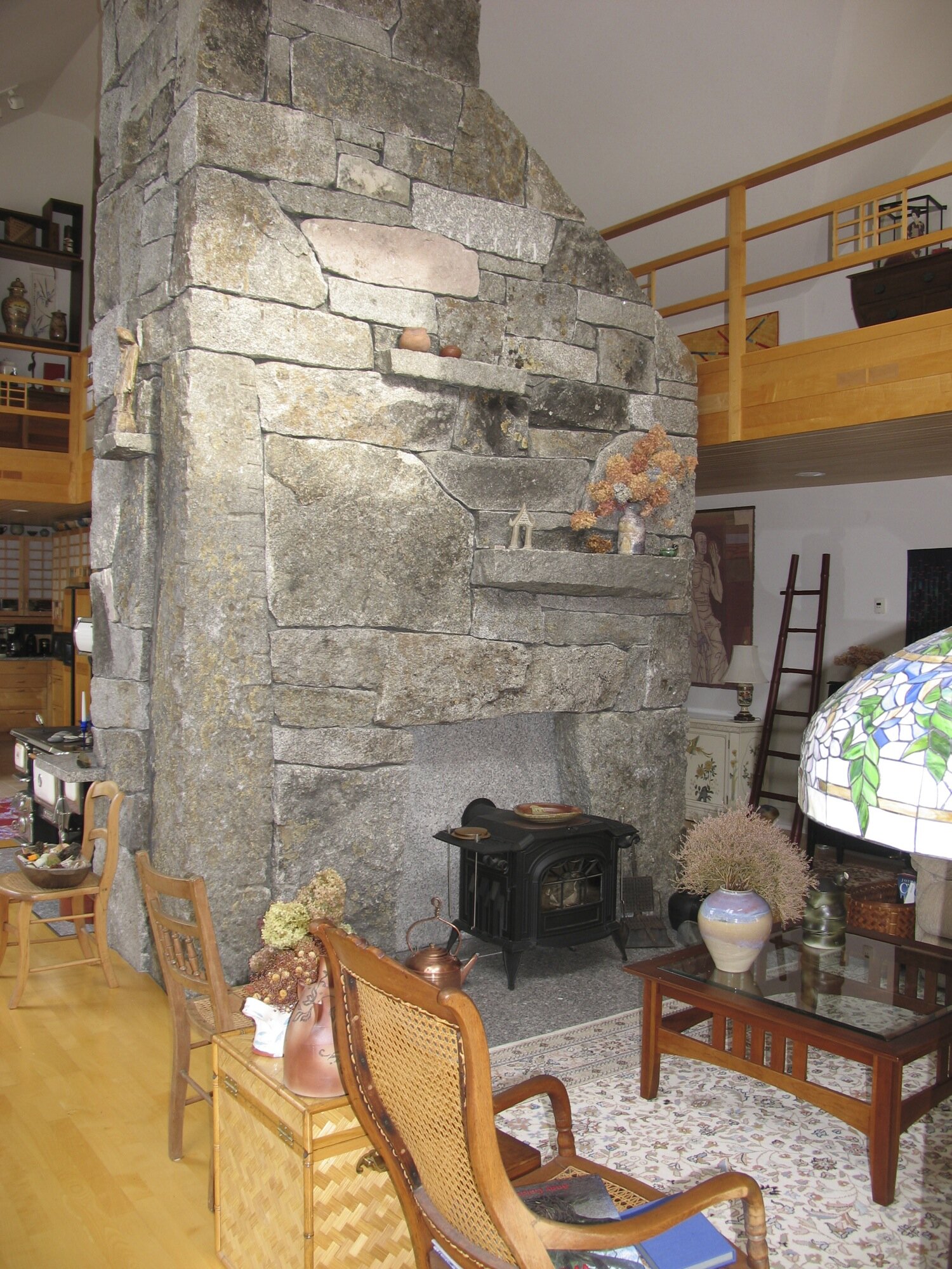 House-seems-like-it-was-built-around-the-fireplace-it-sort-of-was.jpg