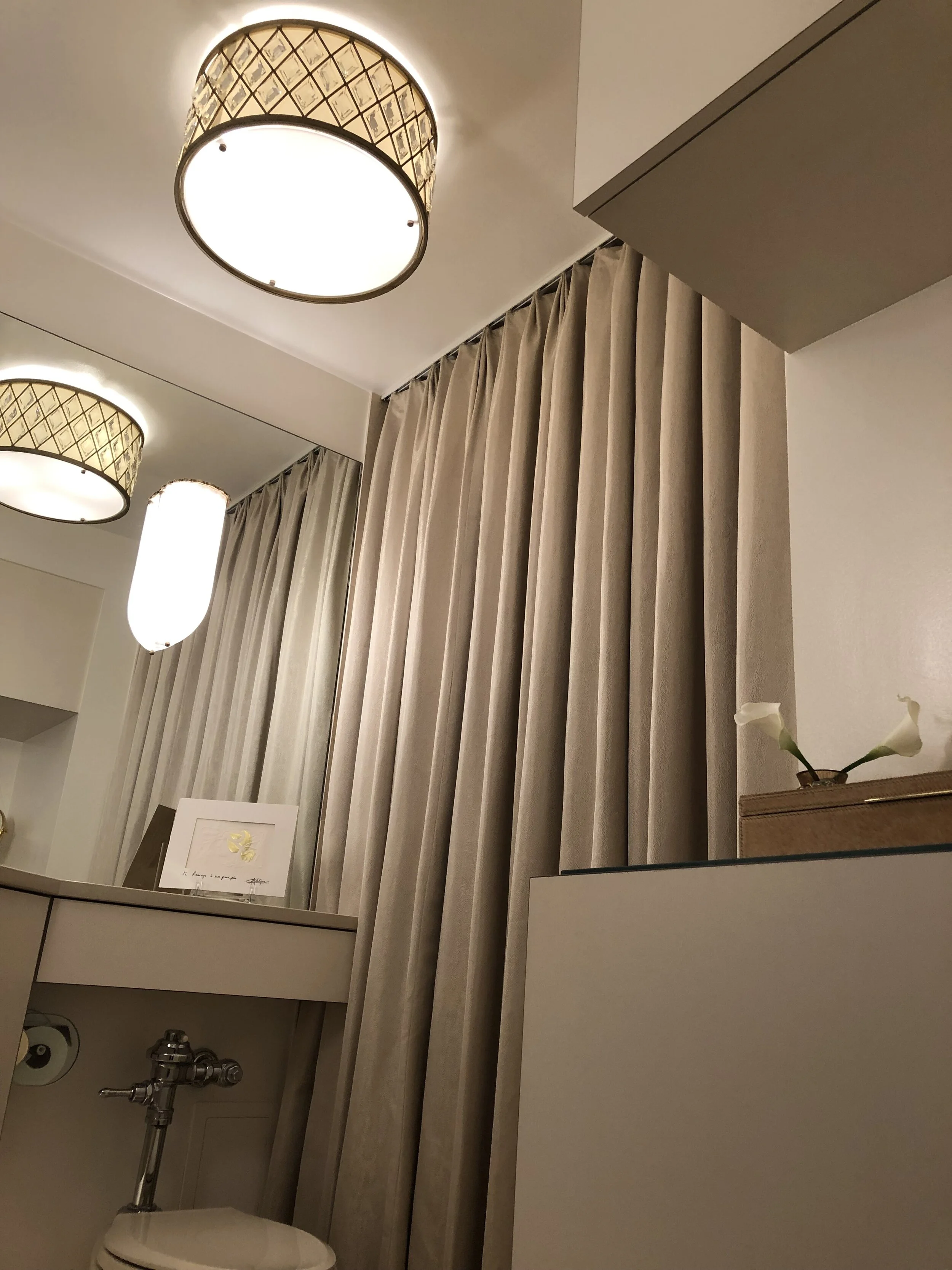 Custom ceiling track mounted shower curtain