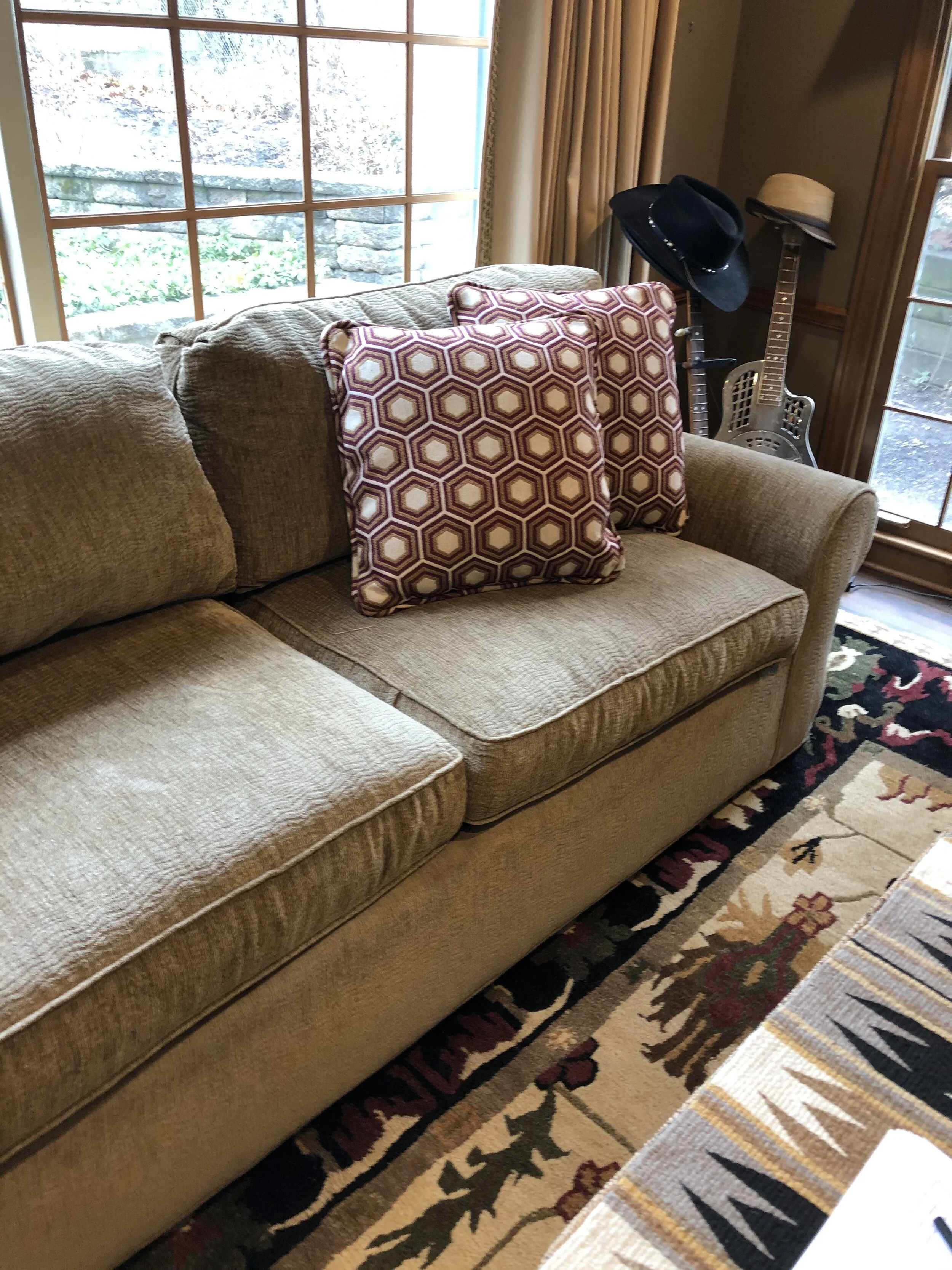 Custom throw pillows are an easy, inexpensive way to add POP to a room!