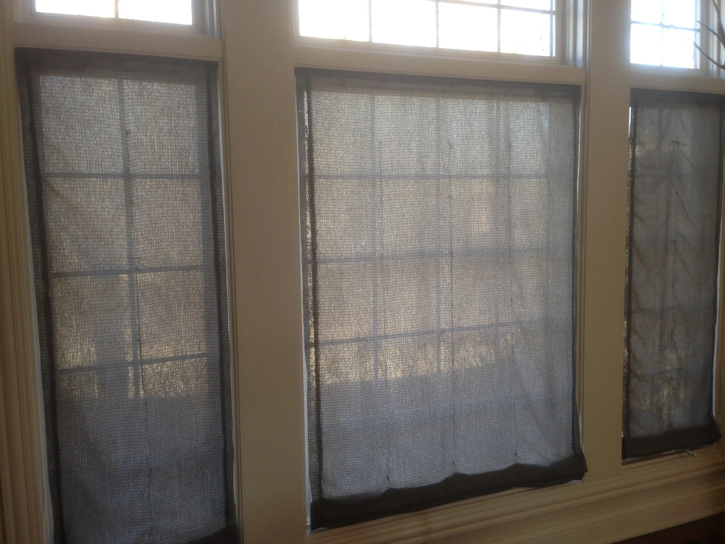 Sheer Roman shades in lowered position