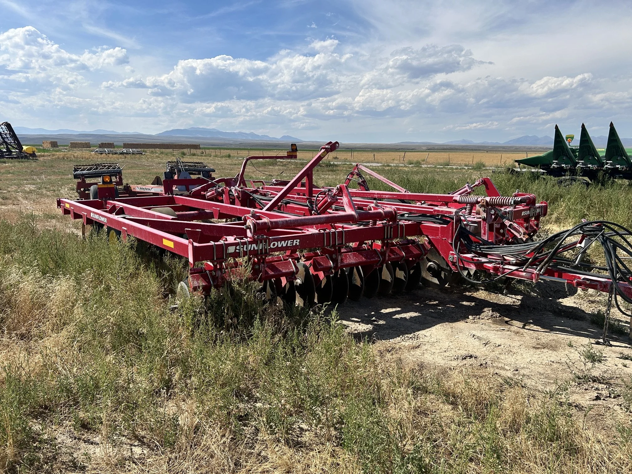 Sunflower 6221-20' Landfinisher & Unverferth rolling harrow