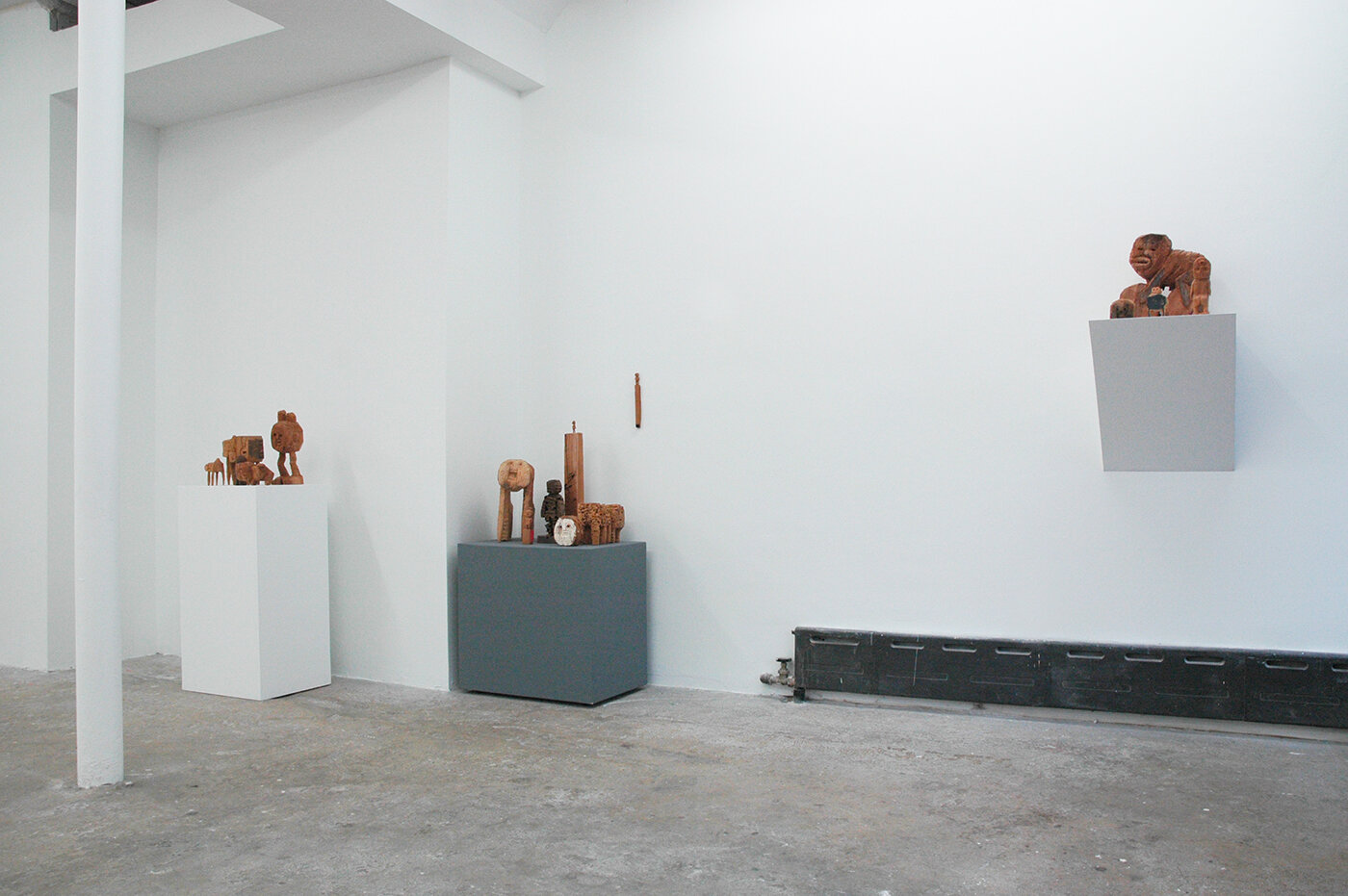 Installation image of sculptures by Hirosuke Yabe from his 2018 exhibition, Faithful Dog Man, at Cindy Rucker Gallery