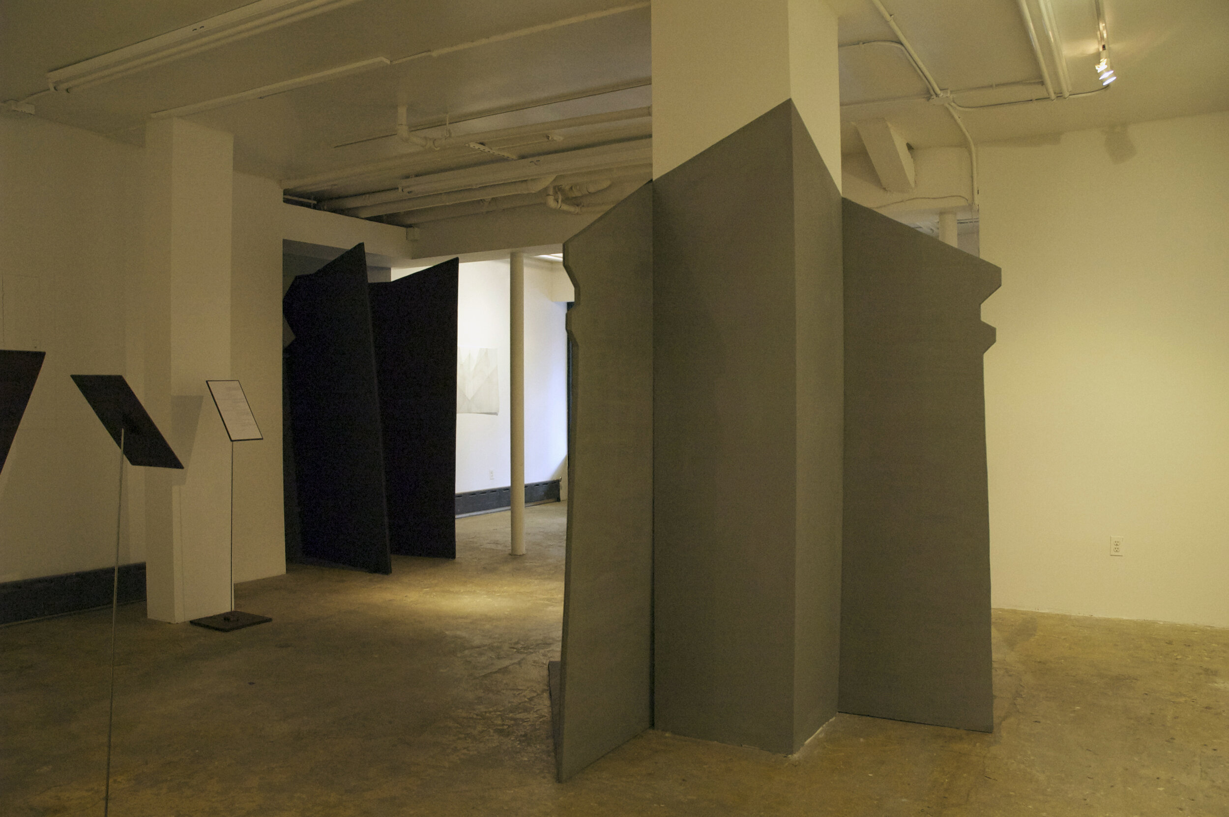 Installation image from the 2013 Adam Hayes exhibition, The room had an imposing dominance over the man, at Cindy Rucker Gallery