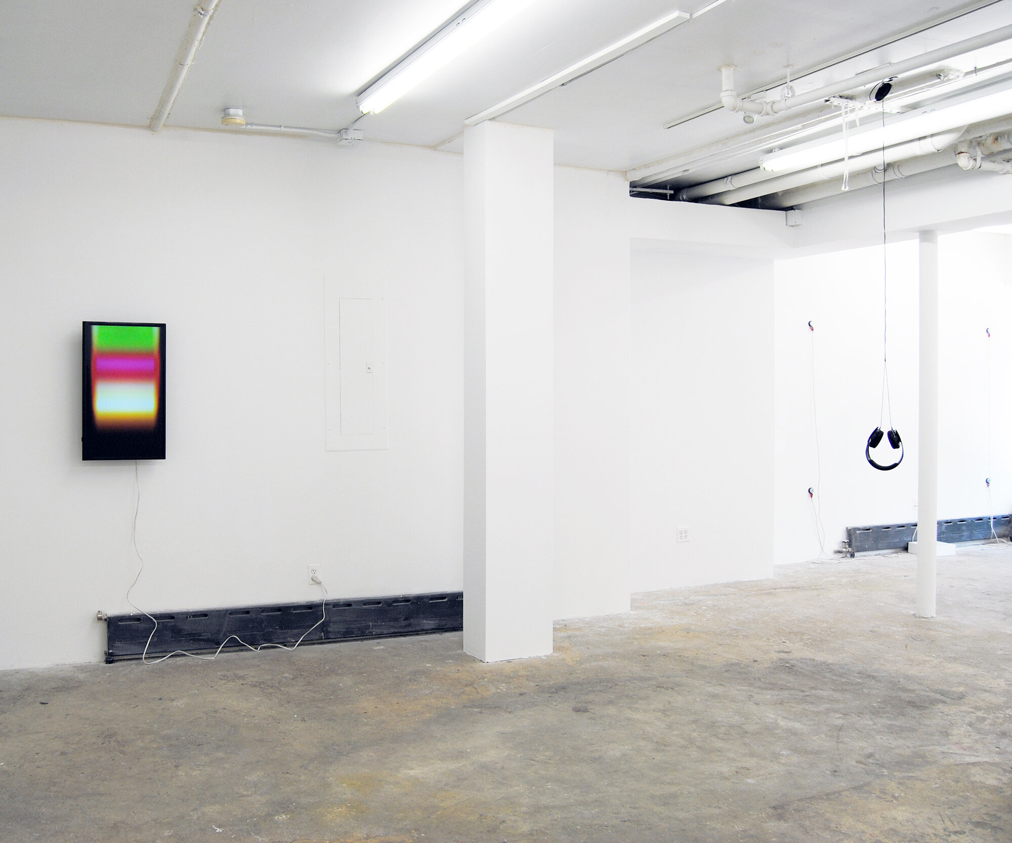 Installation image from the 2016 exhibition, SOUND I, featuring works by Richard Garet and Crystal Z. Campbell, at Cindy Rucker Gallery