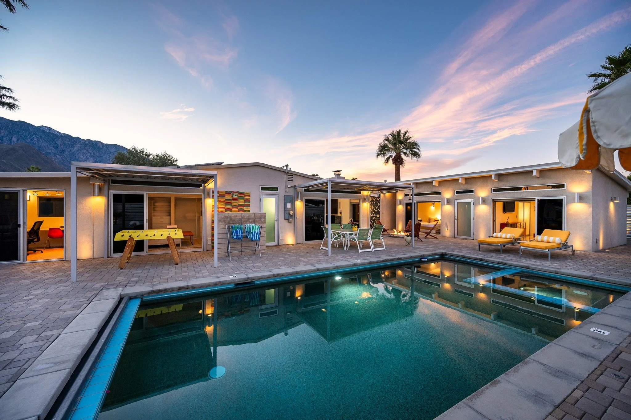 A stunning mid-century modern Palm Springs property with a backyard that truly steals the show.

Sweeping mountain views, unreal sunsets, and skies that completely change throughout the day&mdash;each hour feels like a different mood. From the BBQ is
