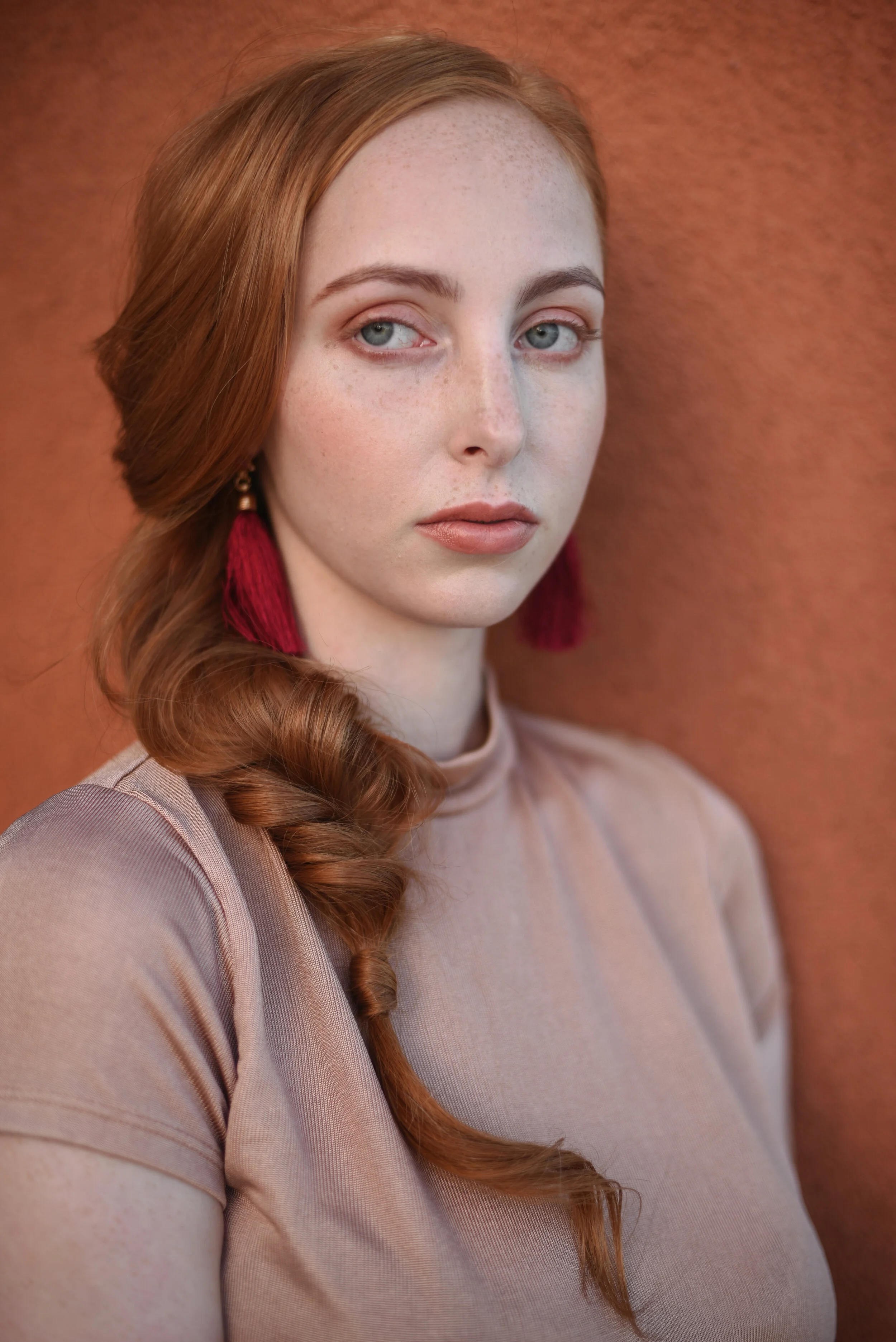 elegant side braid formal hairstyle on redhead 