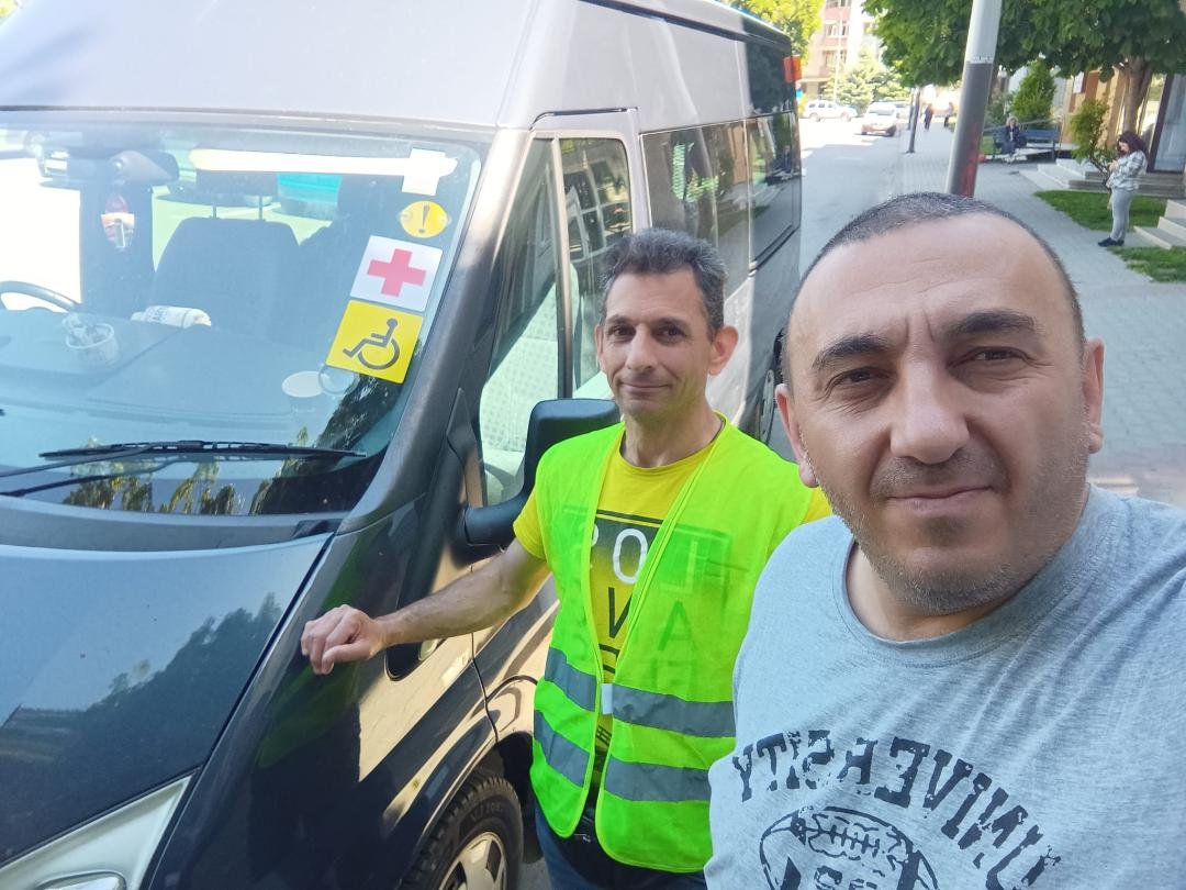 Archie and Armen with their van