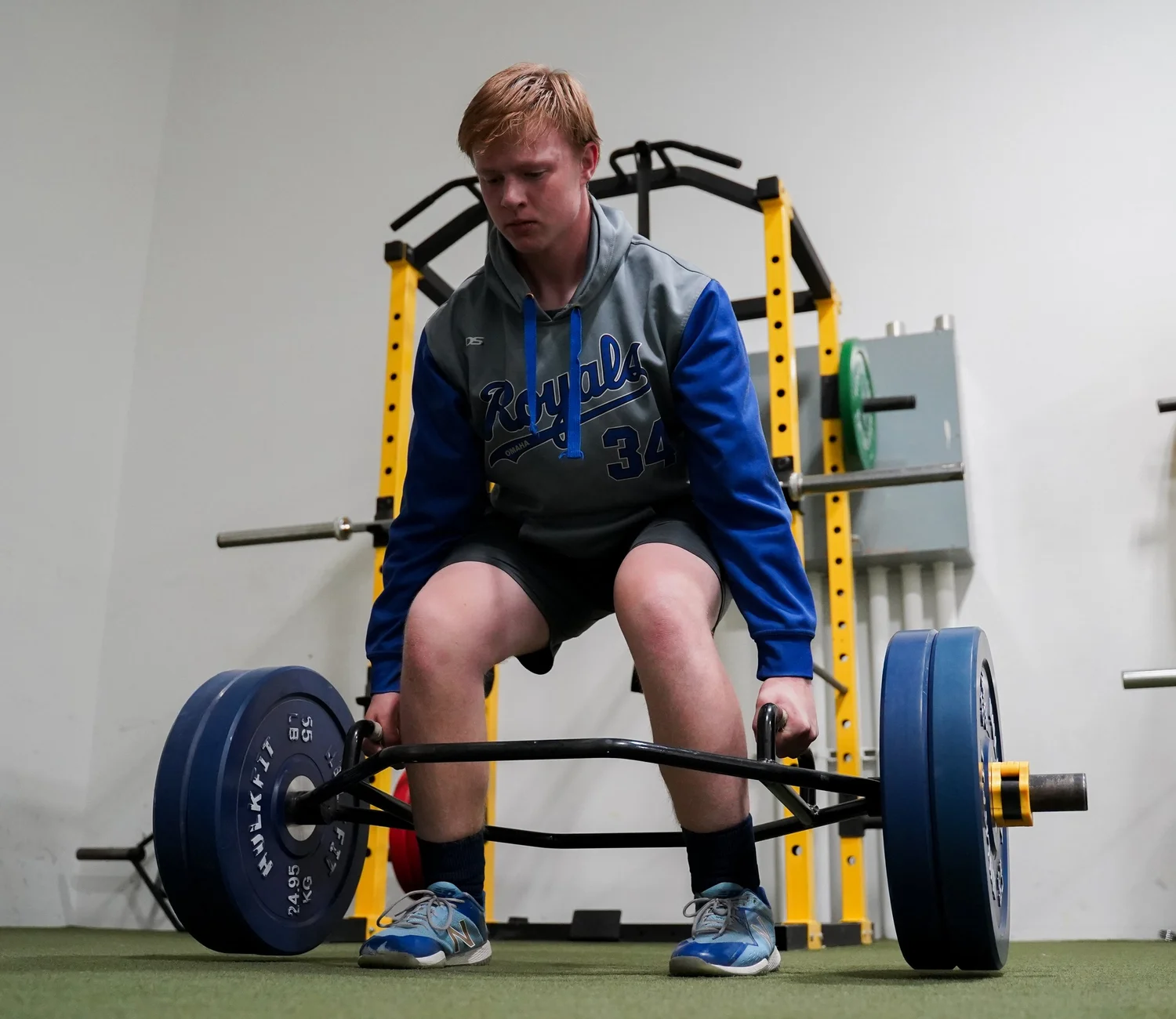 Athlete setting up a trap bar deadlift at Loyalty Training